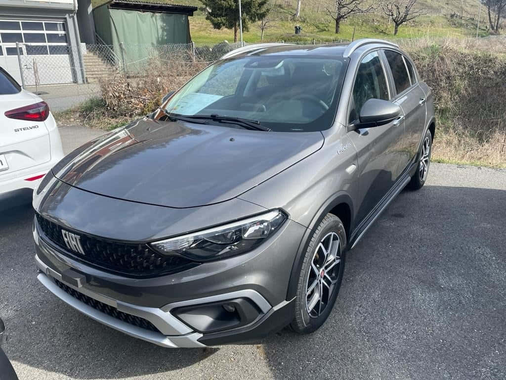 Sleek and Stylish Fiat Tipo on the Road Wallpaper