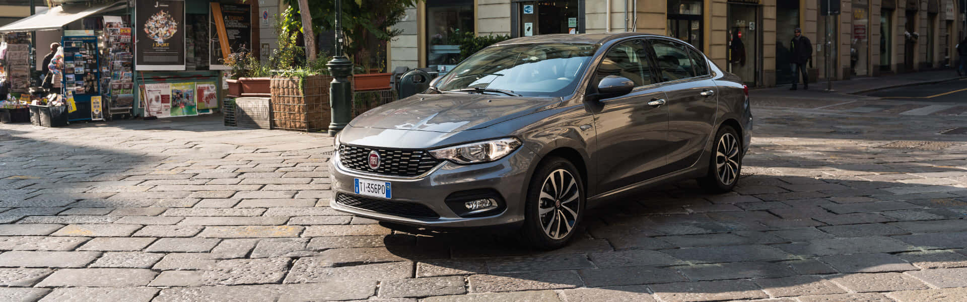 Stylish Fiat Tipo cruising through the city streets Wallpaper