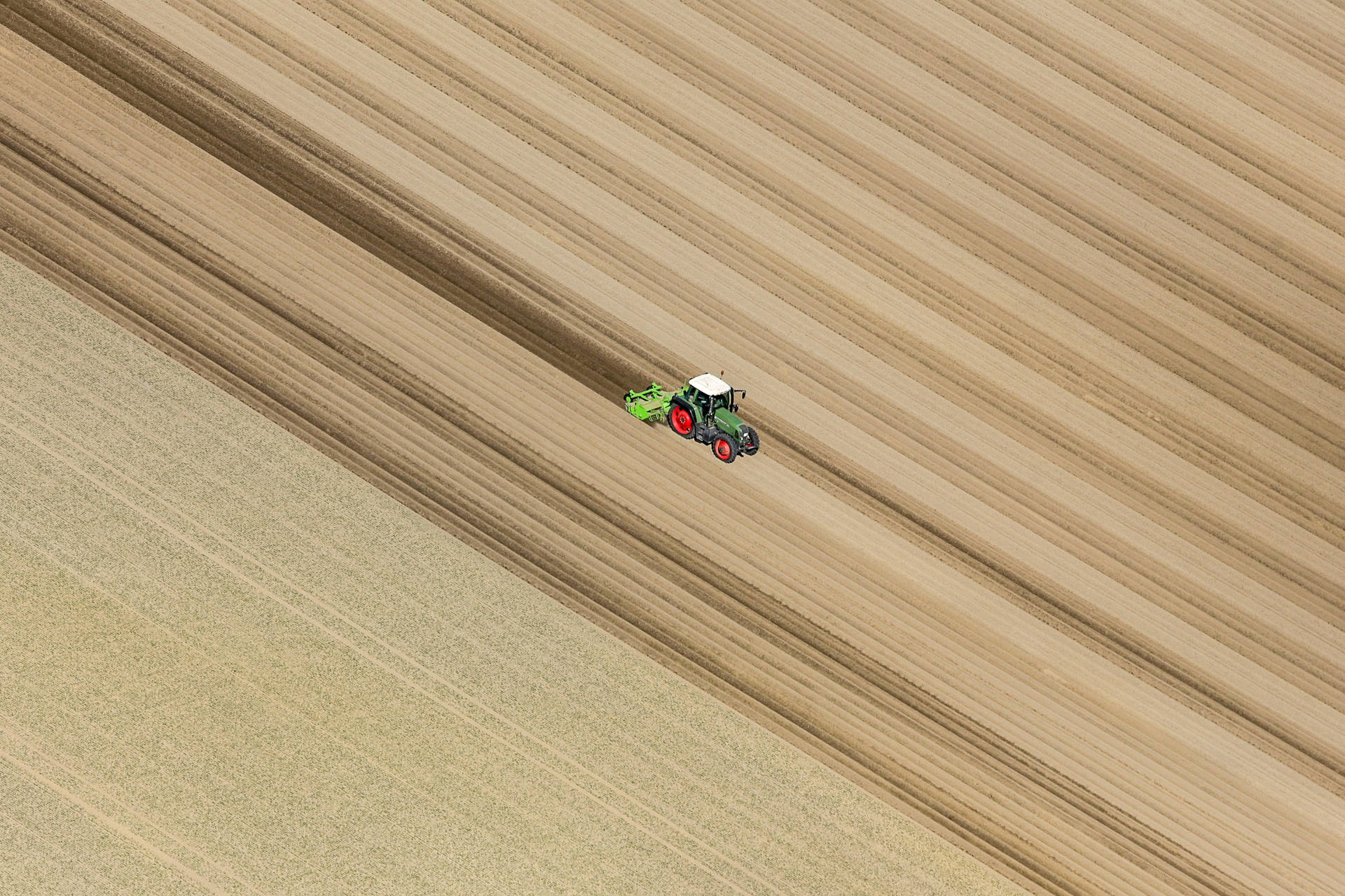 Field With Tractor Bird's-eye View Background
