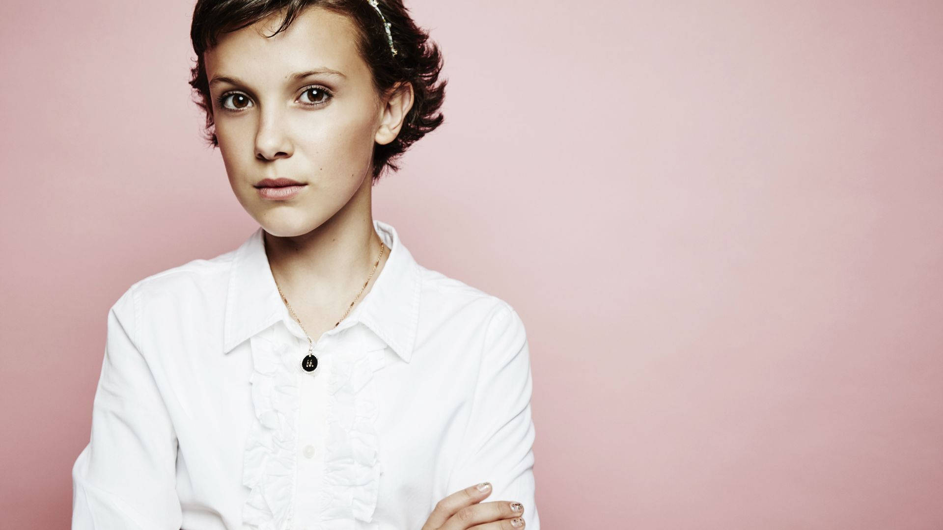 Millie Bobby Brown Showing off a Fierce Look Wallpaper