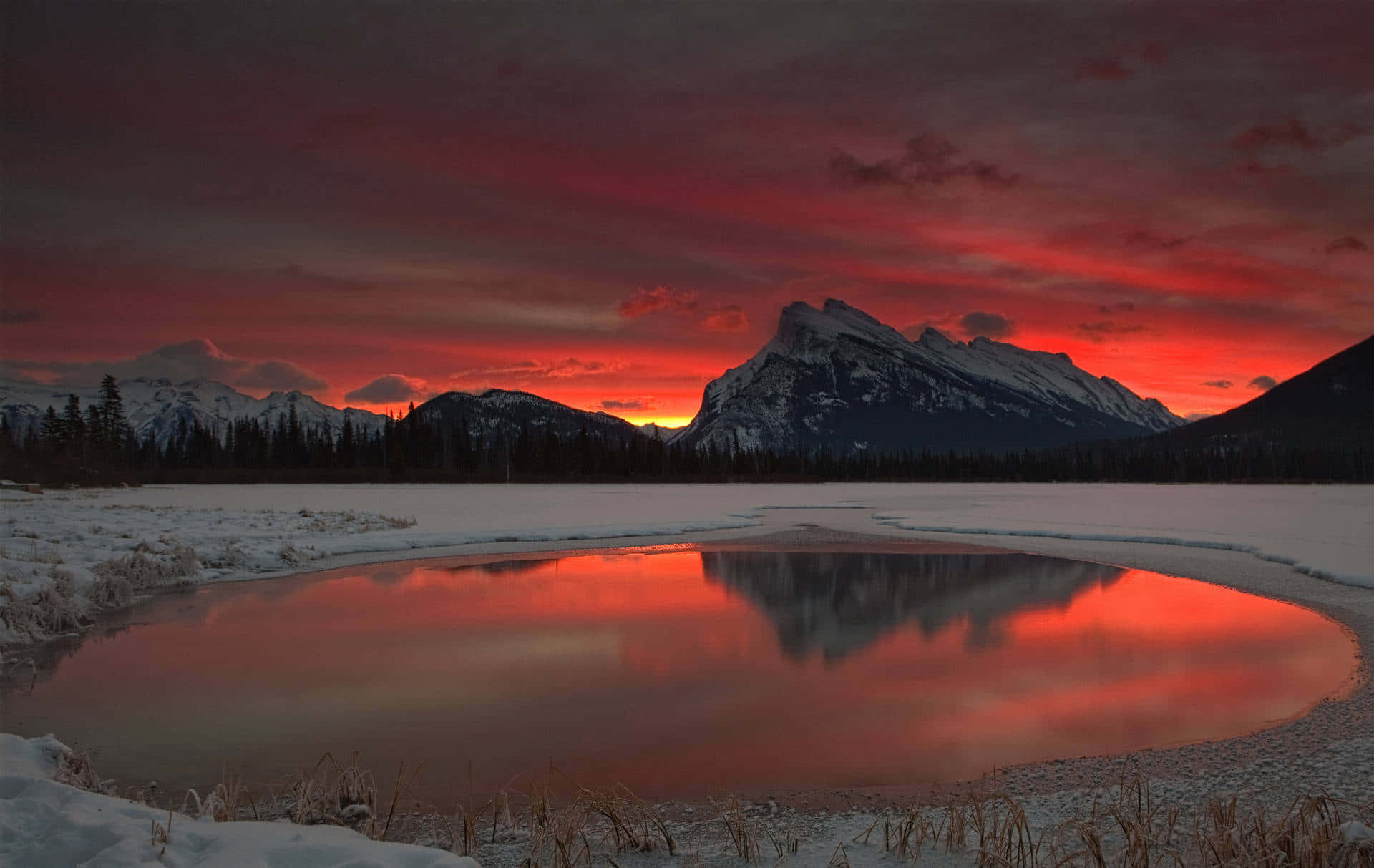 Fiery_ Sunset_ Over_ Snowy_ Mountain_ Lake Wallpaper