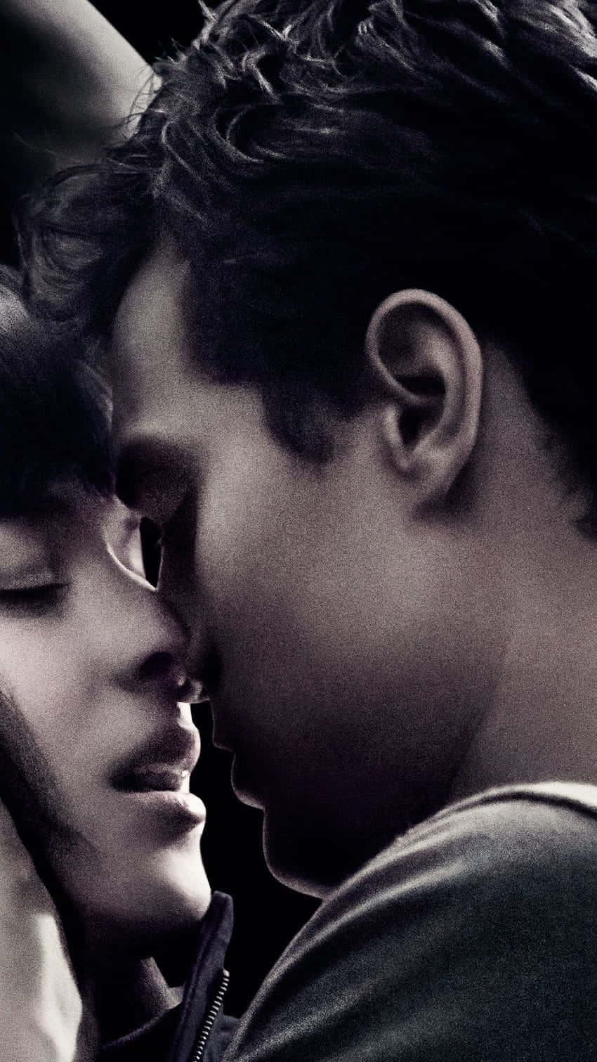 To toner af lidenskab, den romantiske forbindelse mellem Anastasia og Christian i Femte Shades of Grey. Wallpaper