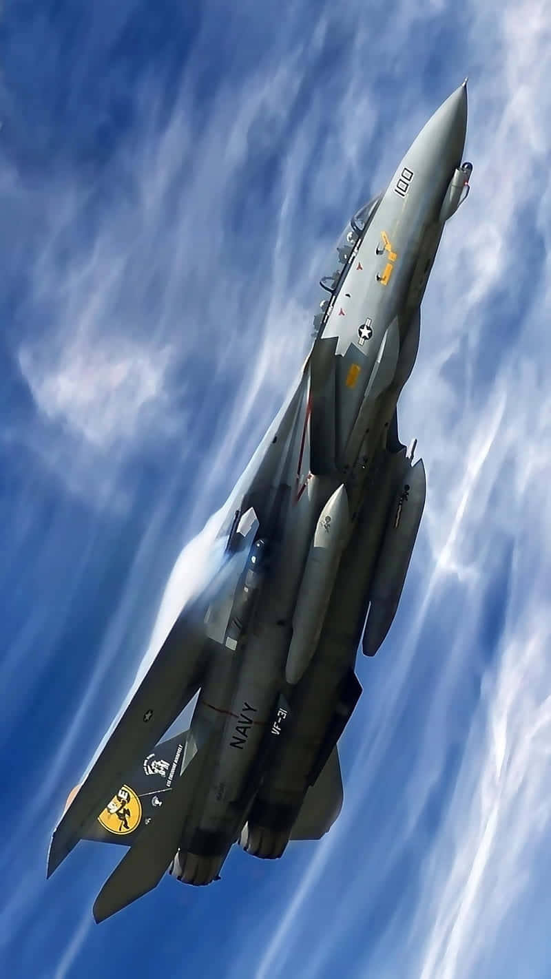 Fighter_ Jet_ Ascending_ Against_ Blue_ Sky Wallpaper