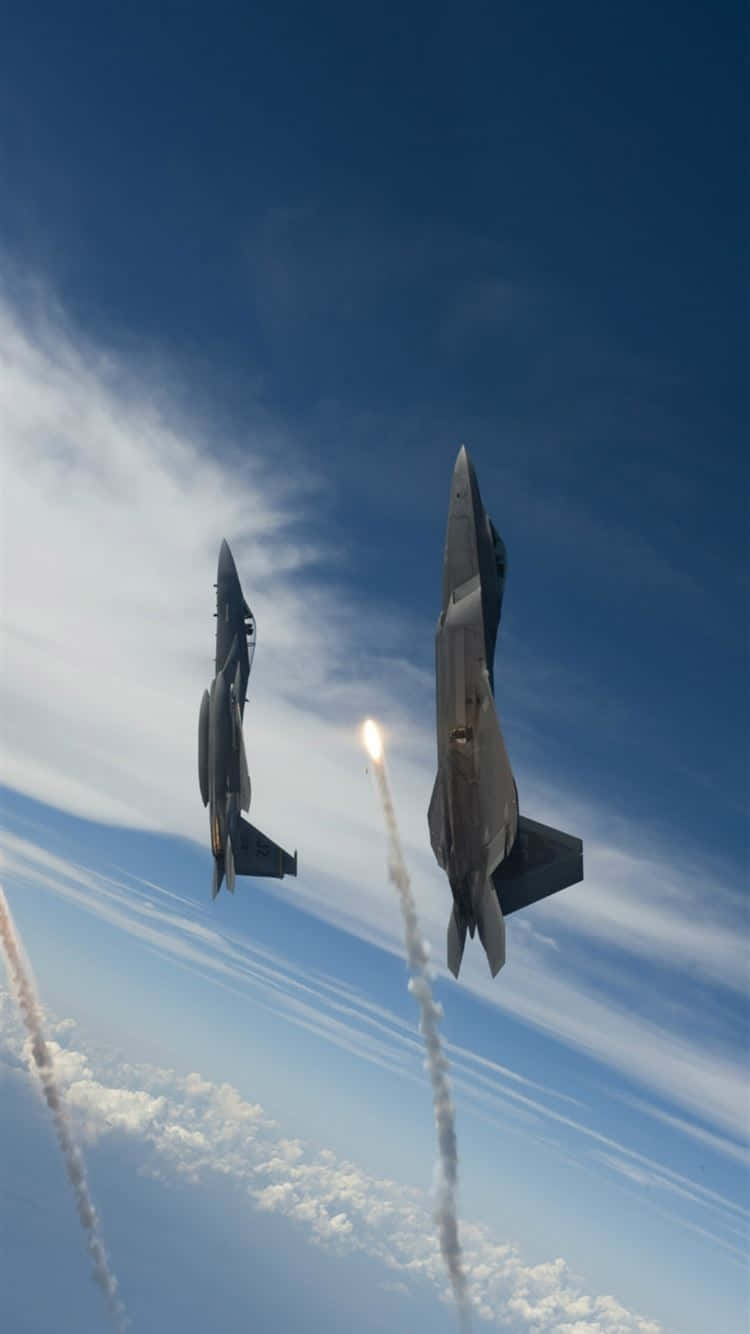 Fighter Jets Maneuveringin Sky Wallpaper