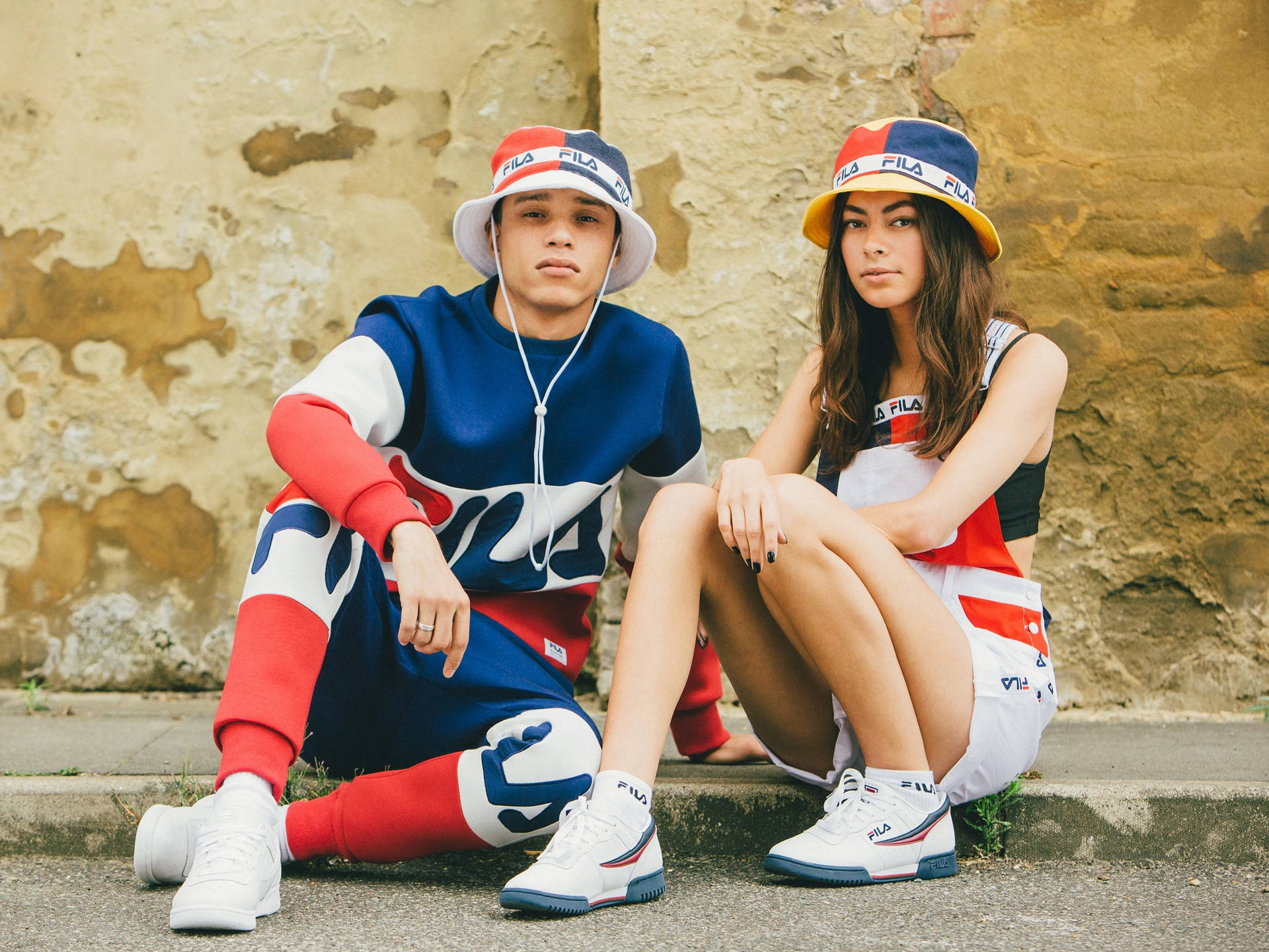 Download Fila Couple Outfit Wallpaper | Wallpapers.com