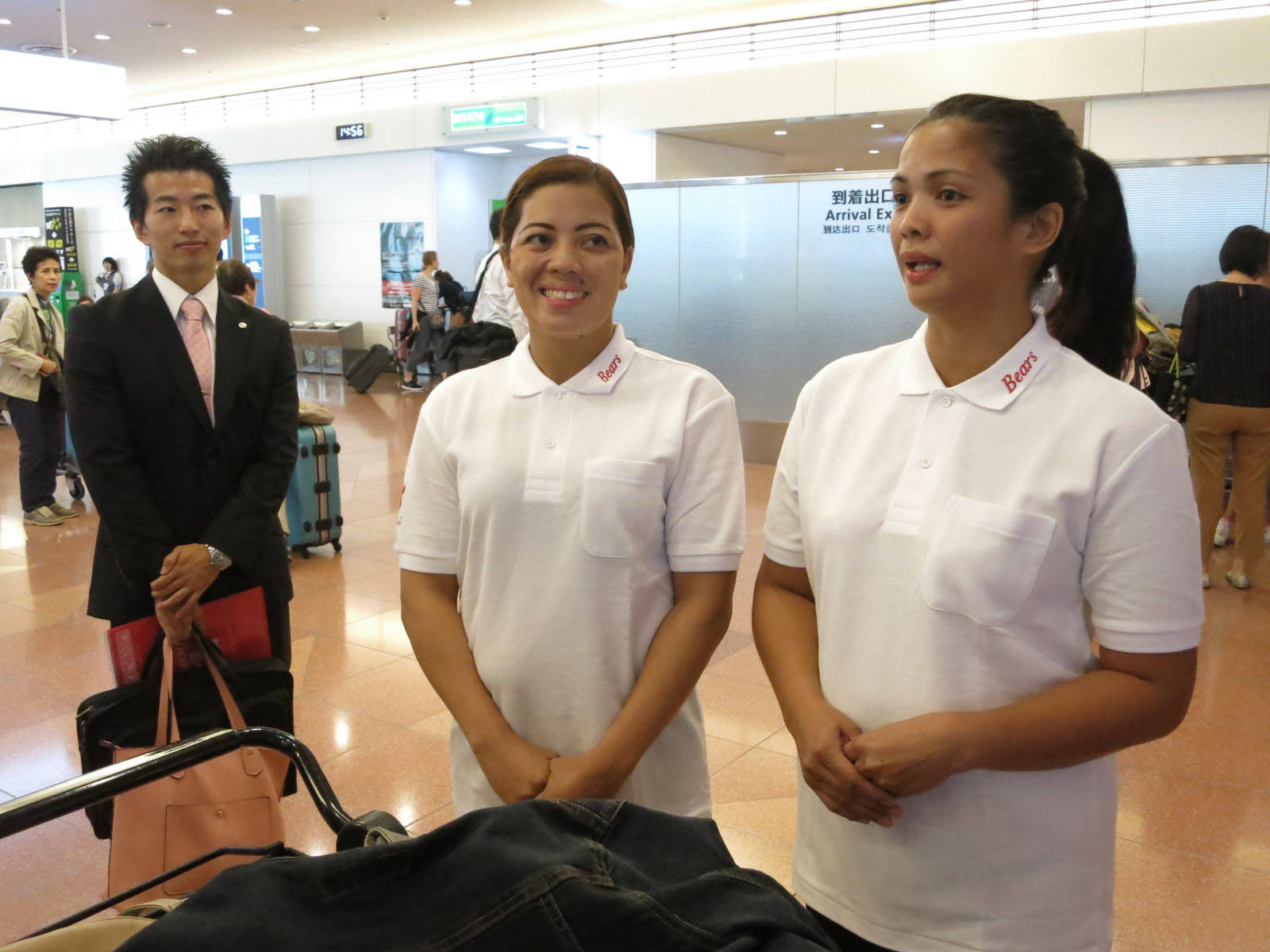 Filipino Housekeepers Arrive In Tokyo Japan Wallpaper