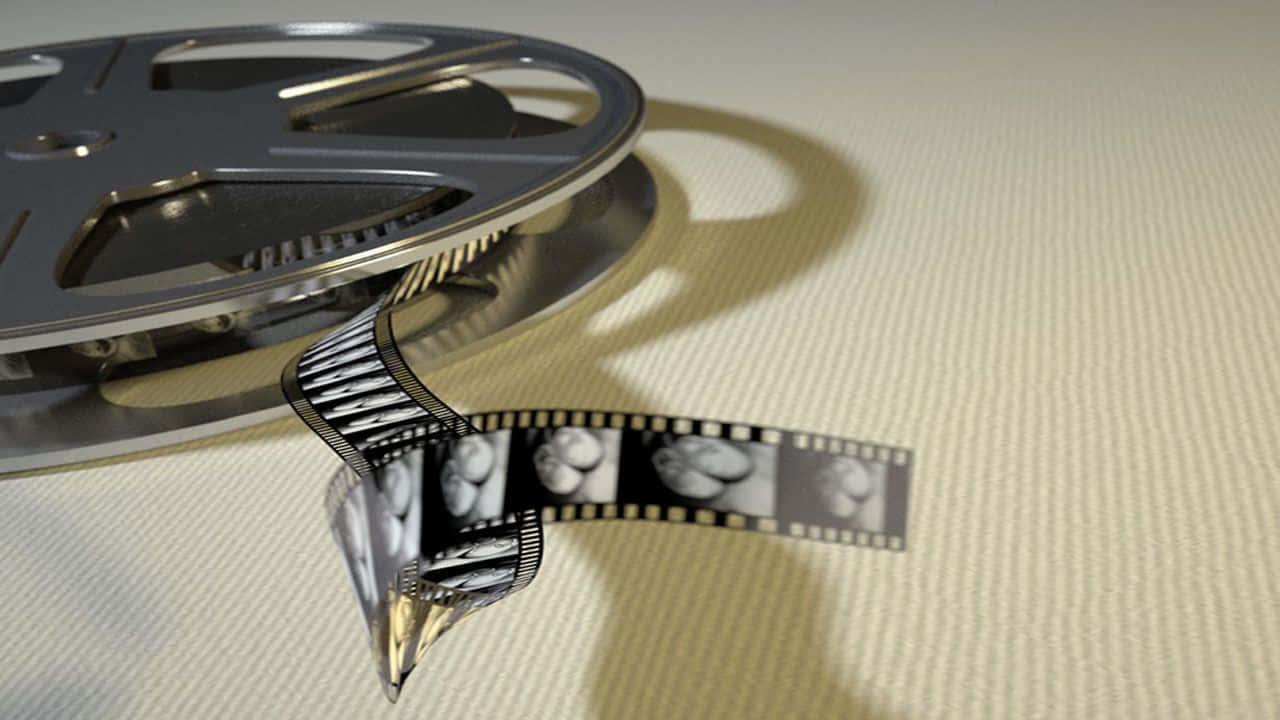 A Film Reel With A Film Strip On It