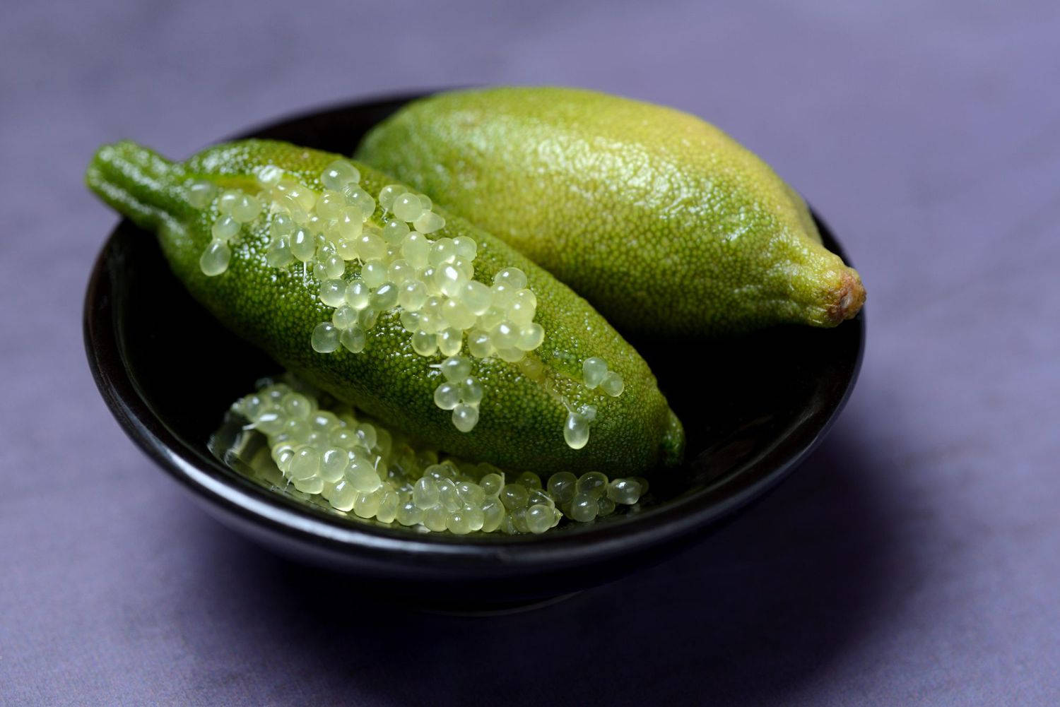 Bowl of Finger Limes: Nature's Citrus Caviar Wallpaper