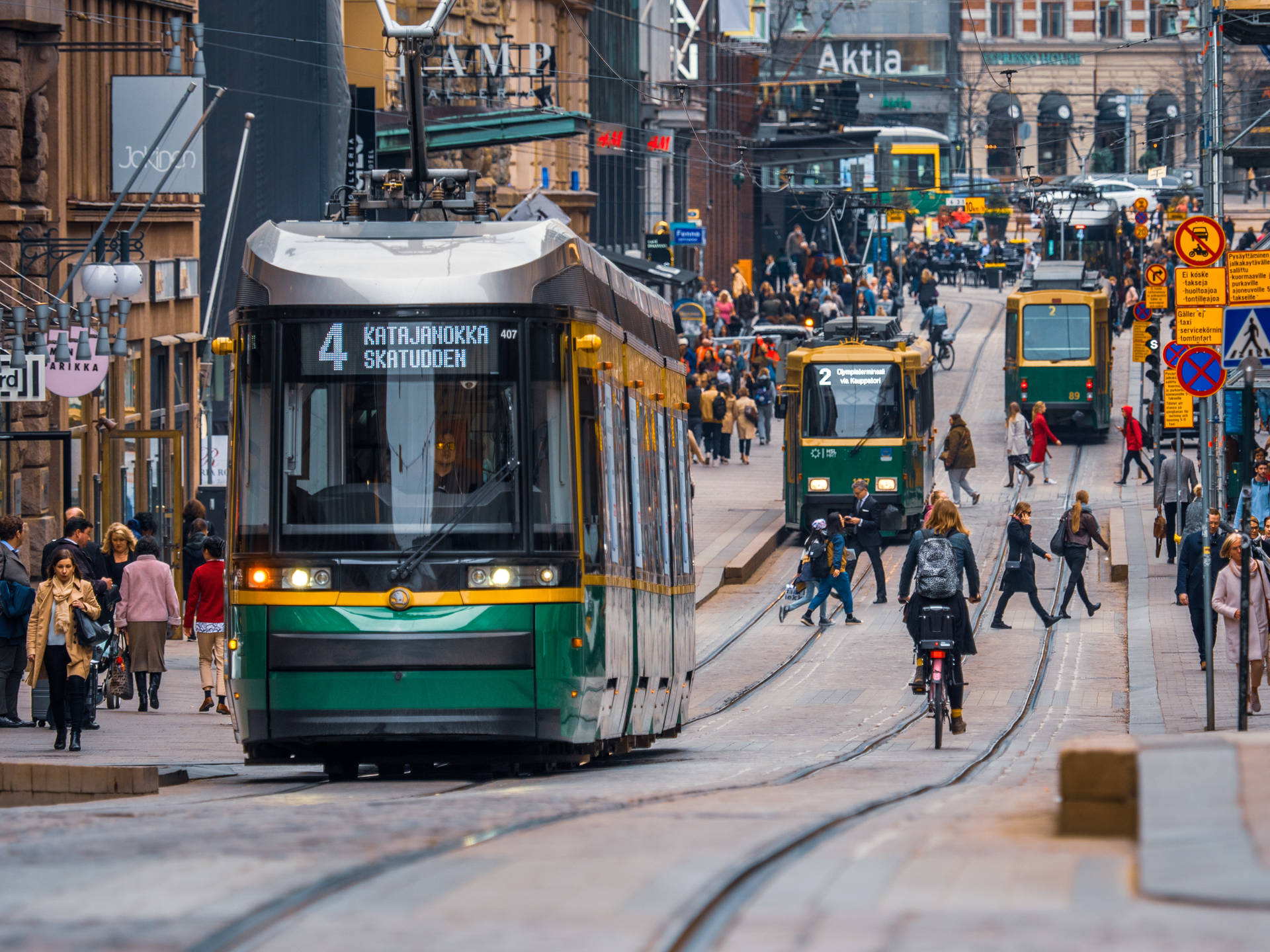 Finland Trams At Busy Street Wallpaper