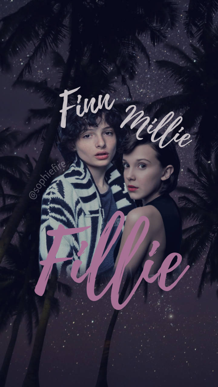 Millie Bobby Brown and Finn Wolfhard at an event Wallpaper