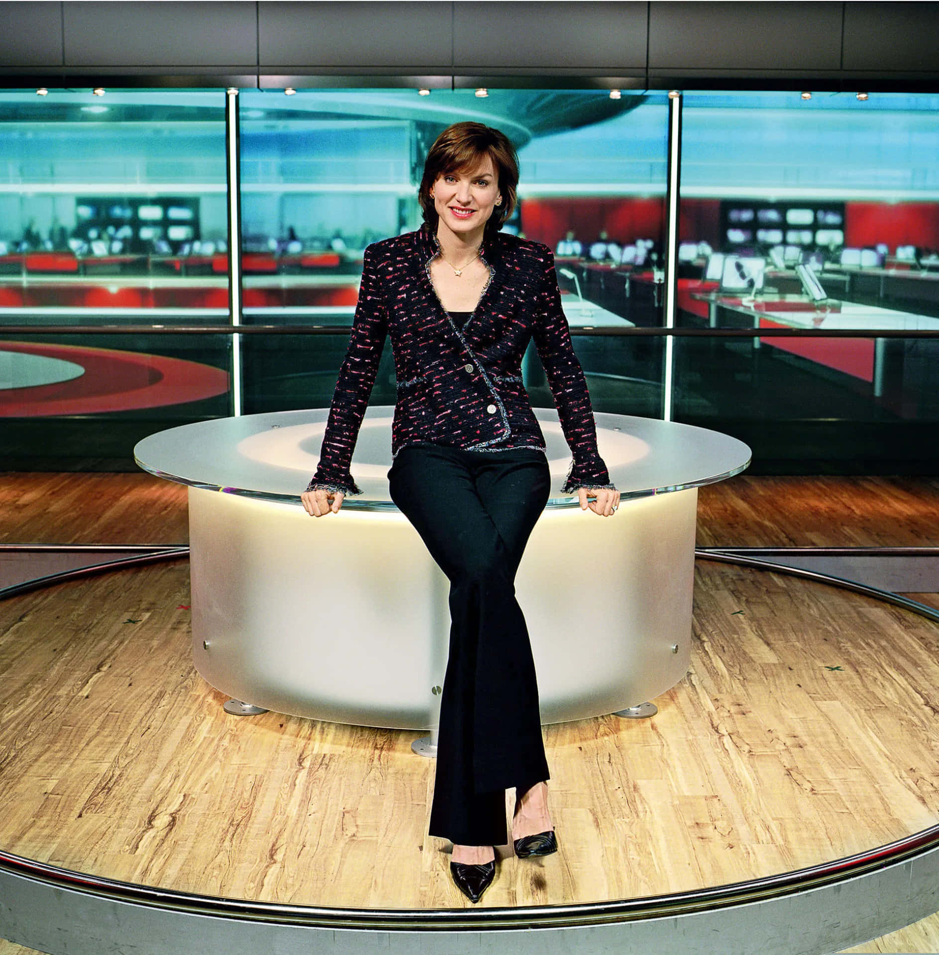 Fiona Bruce smiling during a live recording session Wallpaper