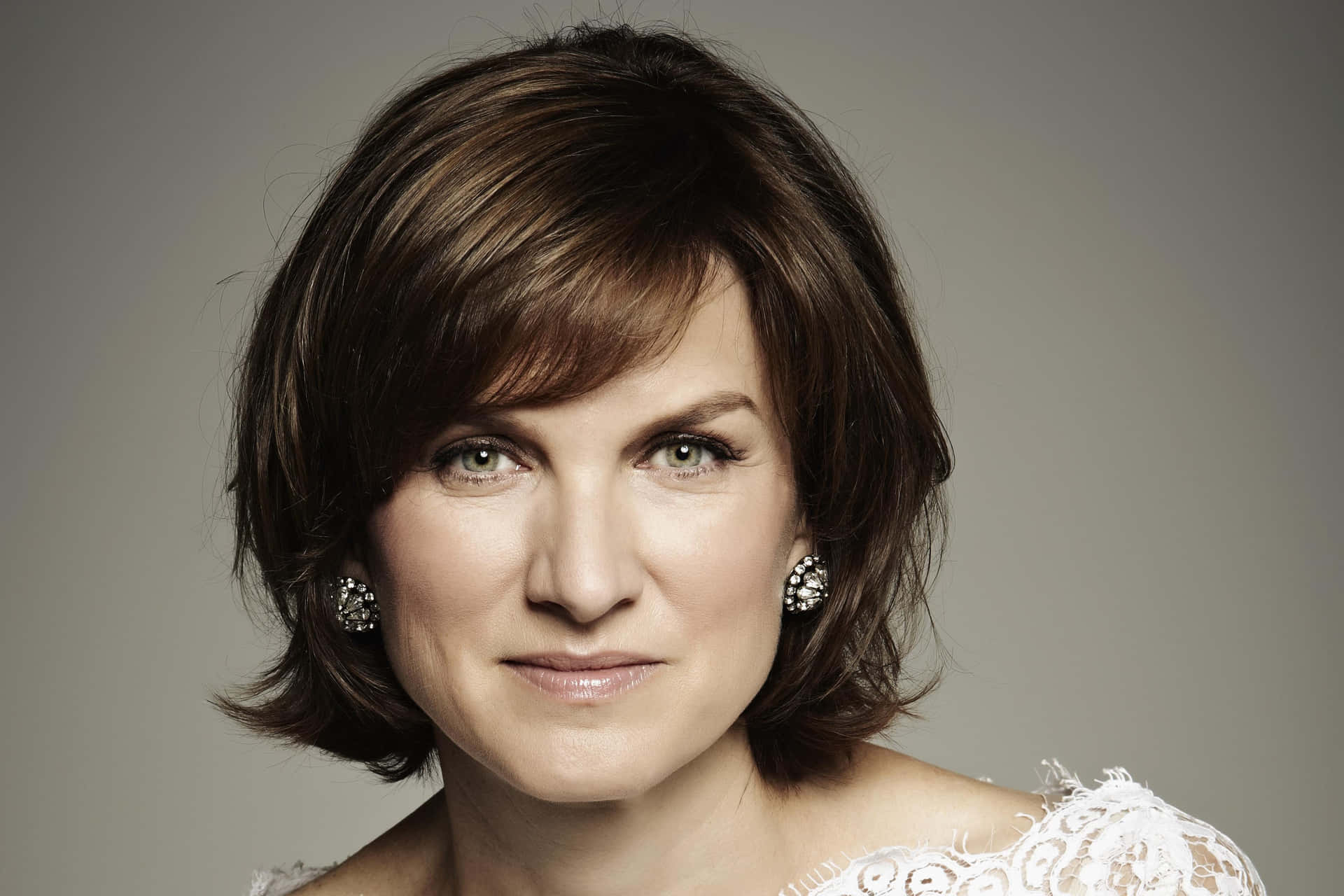 Fiona Bruce in a thoughtful pose during an interview. Wallpaper