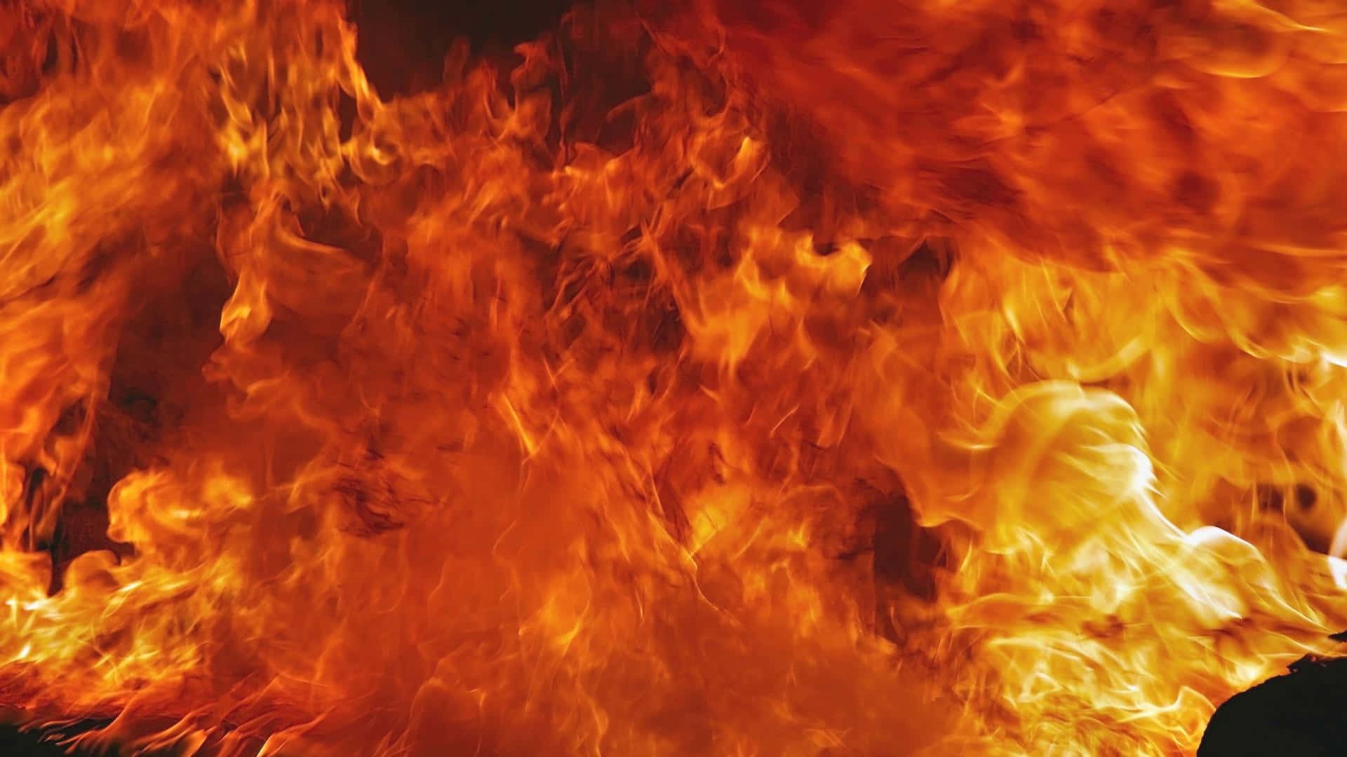 a close up of a fire with flames