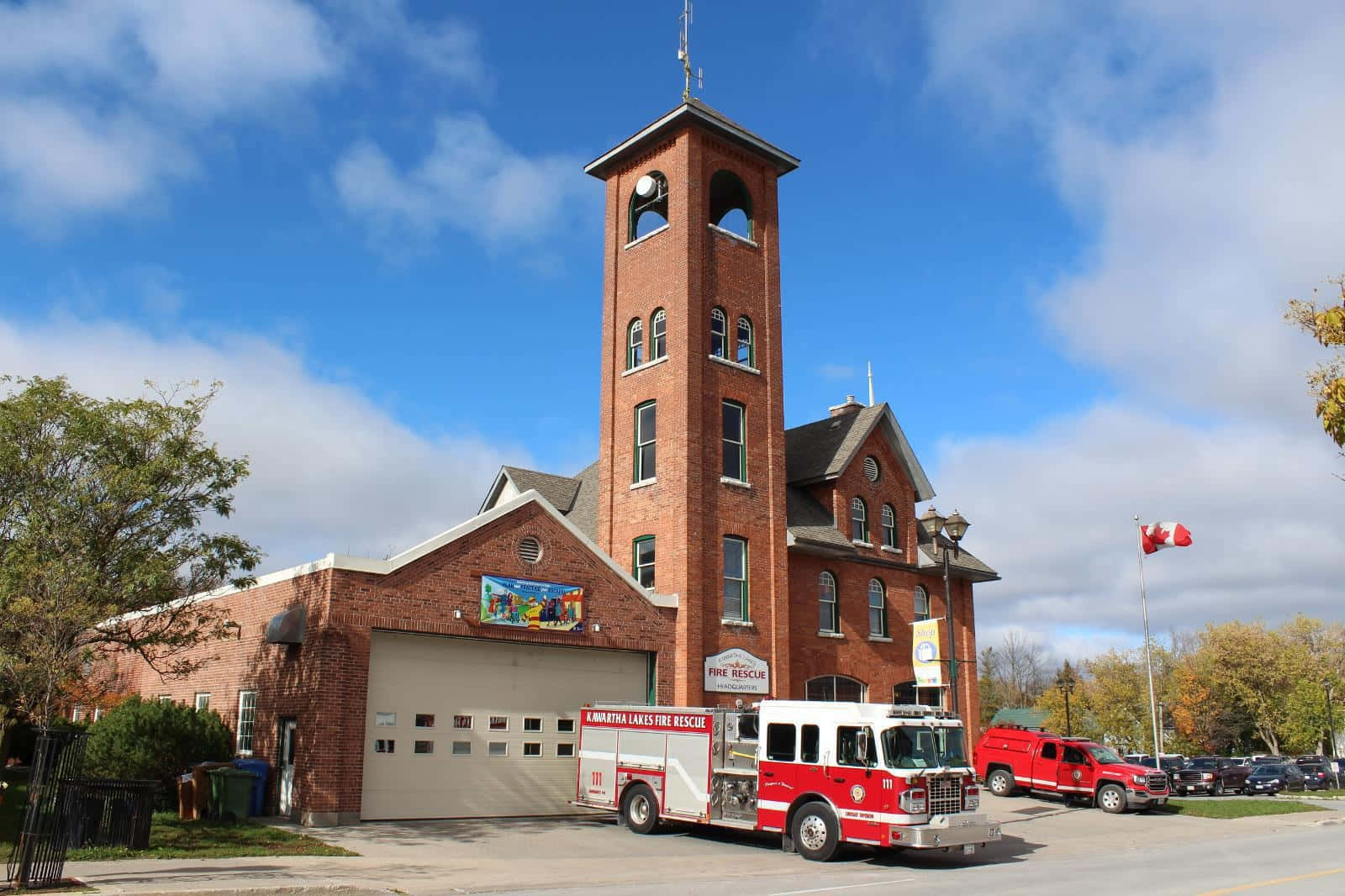 Download Fire Station Brick Buildingwith Tower Wallpaper | Wallpapers.com