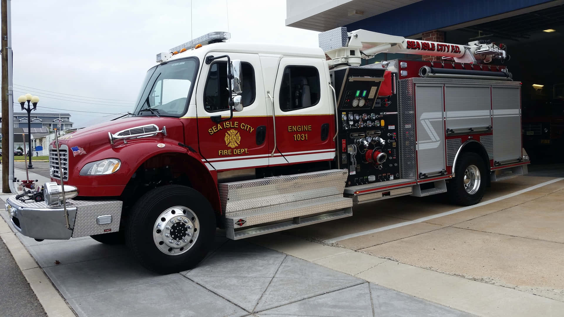 A Fire Truck Parked In Front Of A Building