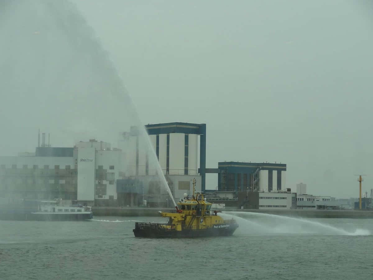 Fireboat Displayin Vlaardingen Harbor Wallpaper