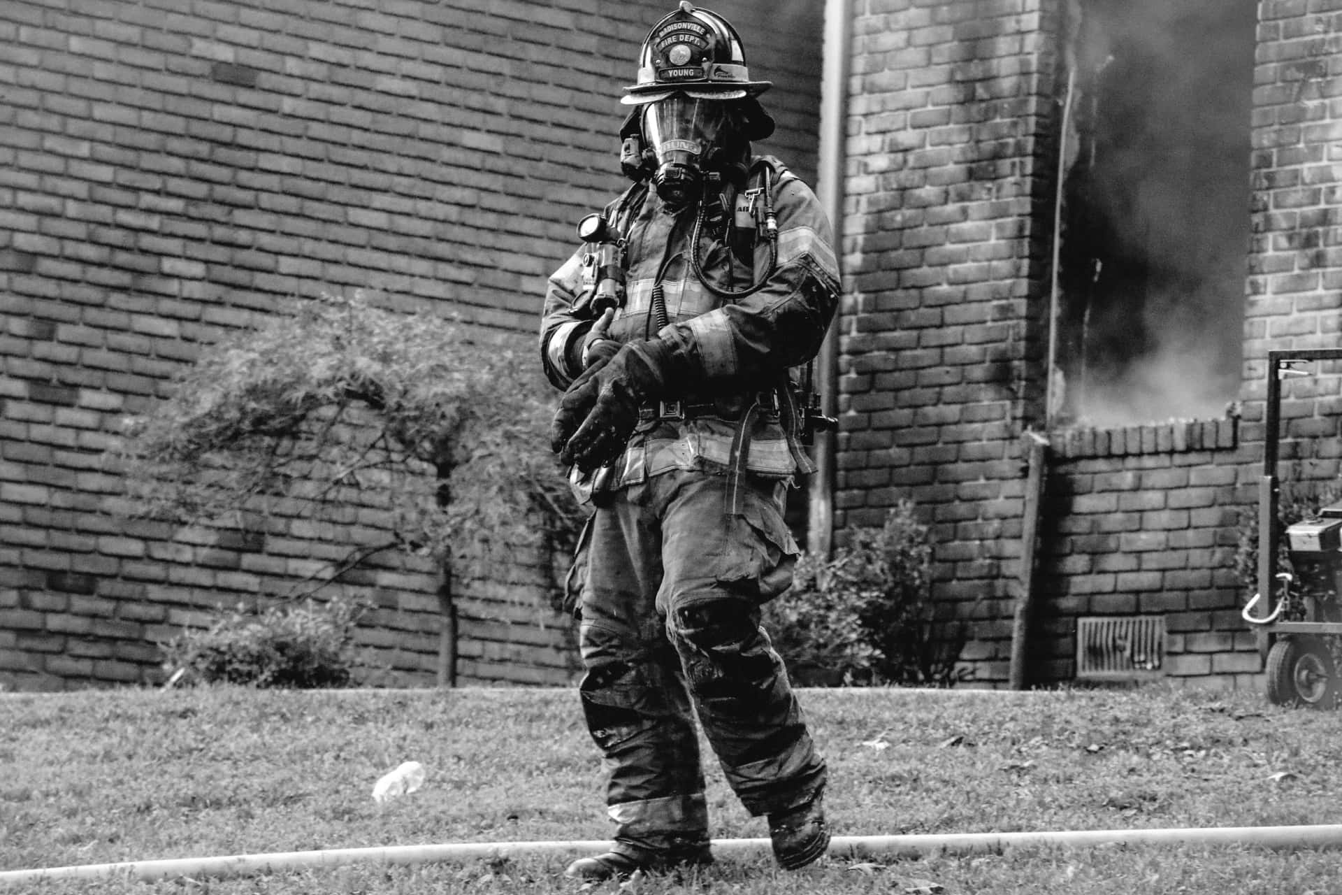 Image  A daring firefighter braving a flaming inferno