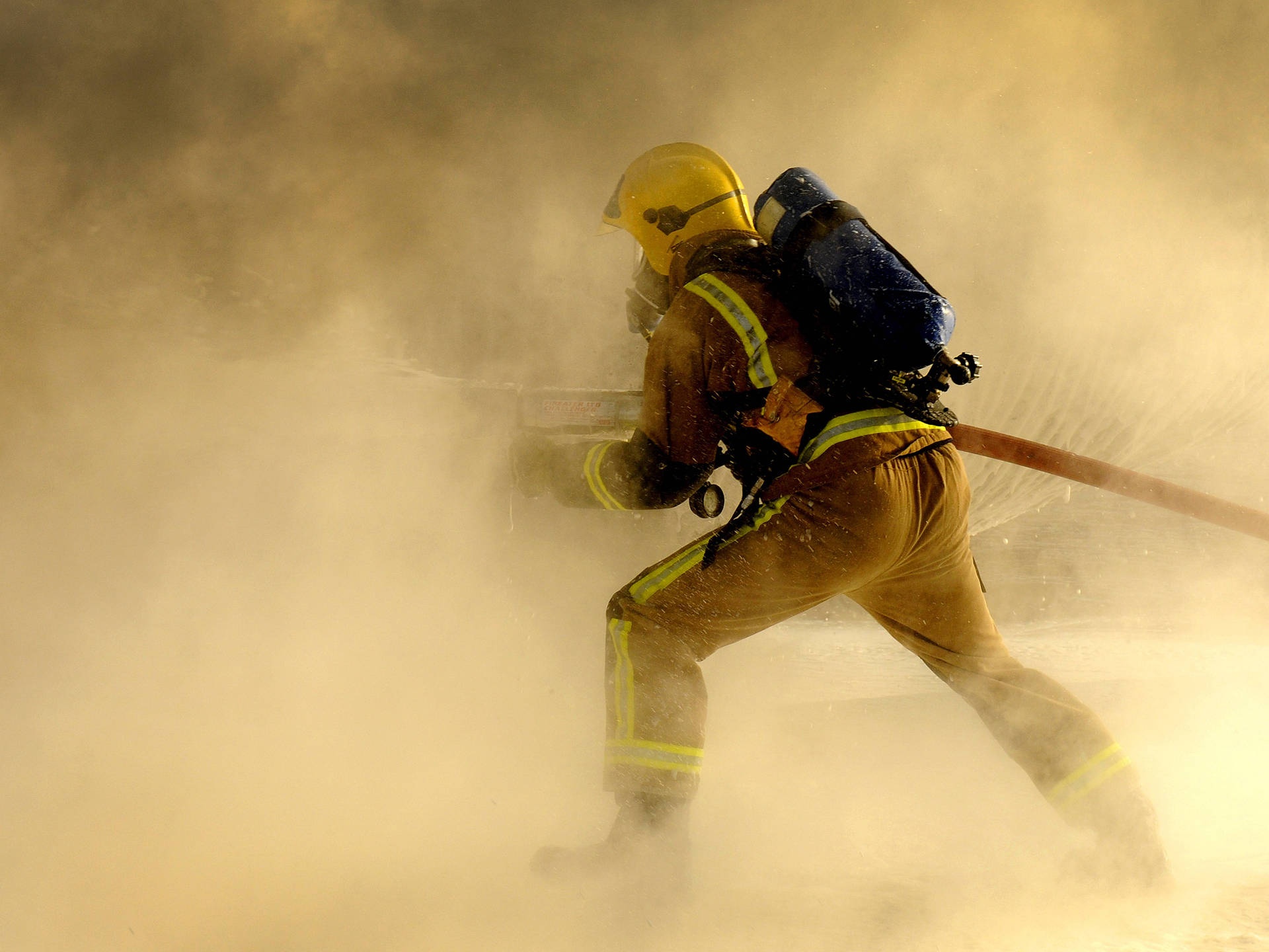 Firefighter In Smoky Operation Wallpaper