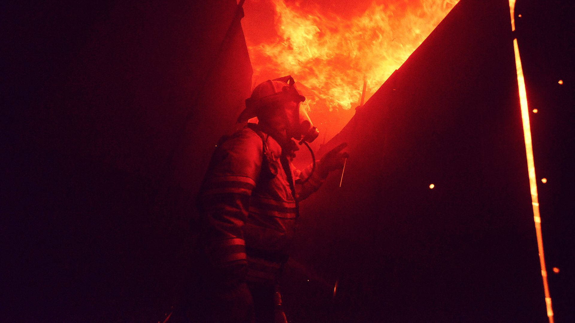 Firefighter In The Dark Fire Wallpaper
