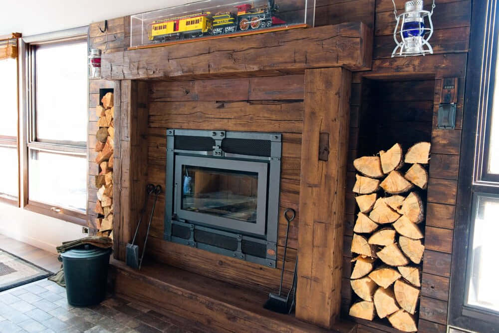 A Fireplace With Logs In It