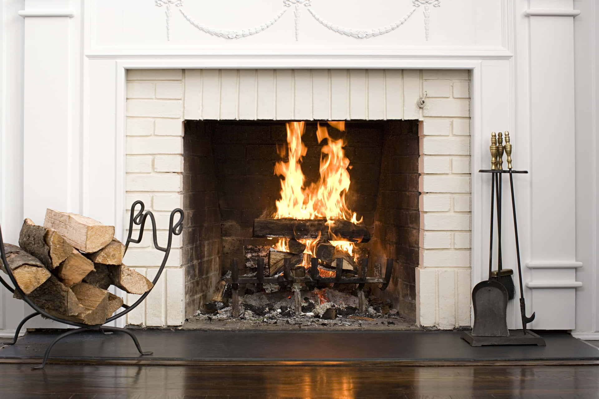 Enjoy the warmth of a cozy crackling fire in a beautiful stone fireplace.