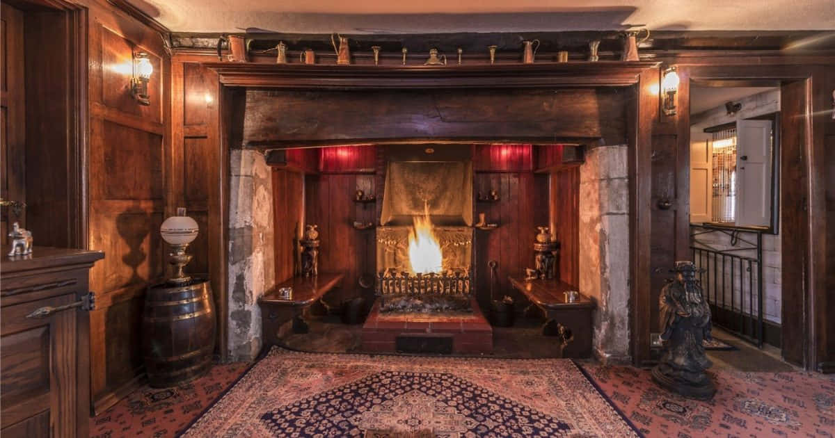 A Fireplace In A Room With Wooden Floors