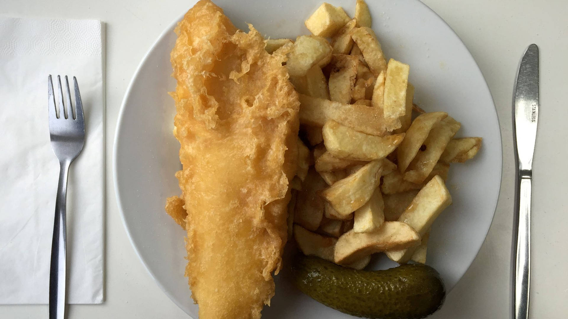 Fish And Chips With Whole Pickle Wallpaper