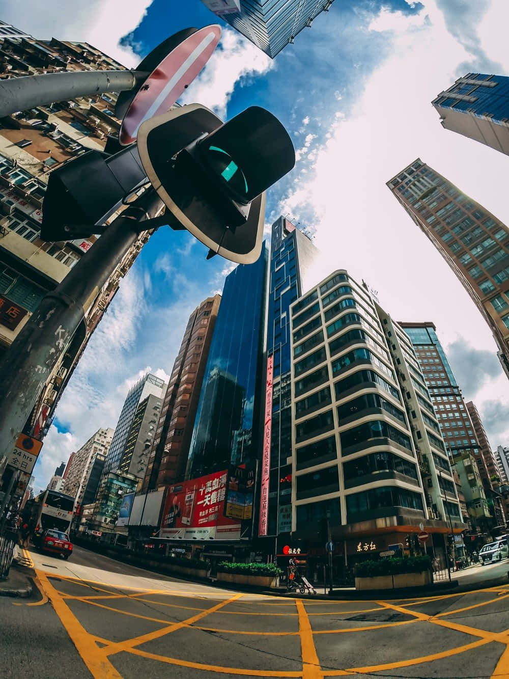A Fish Eye View Of A City Street With Tall Buildings