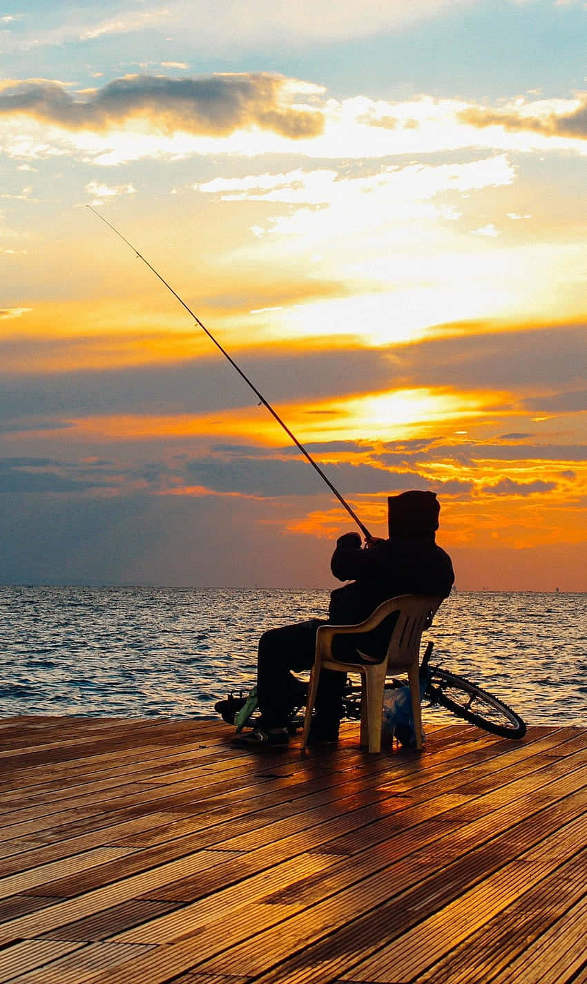 Angler's Dream - Fishing rod ready for action Wallpaper