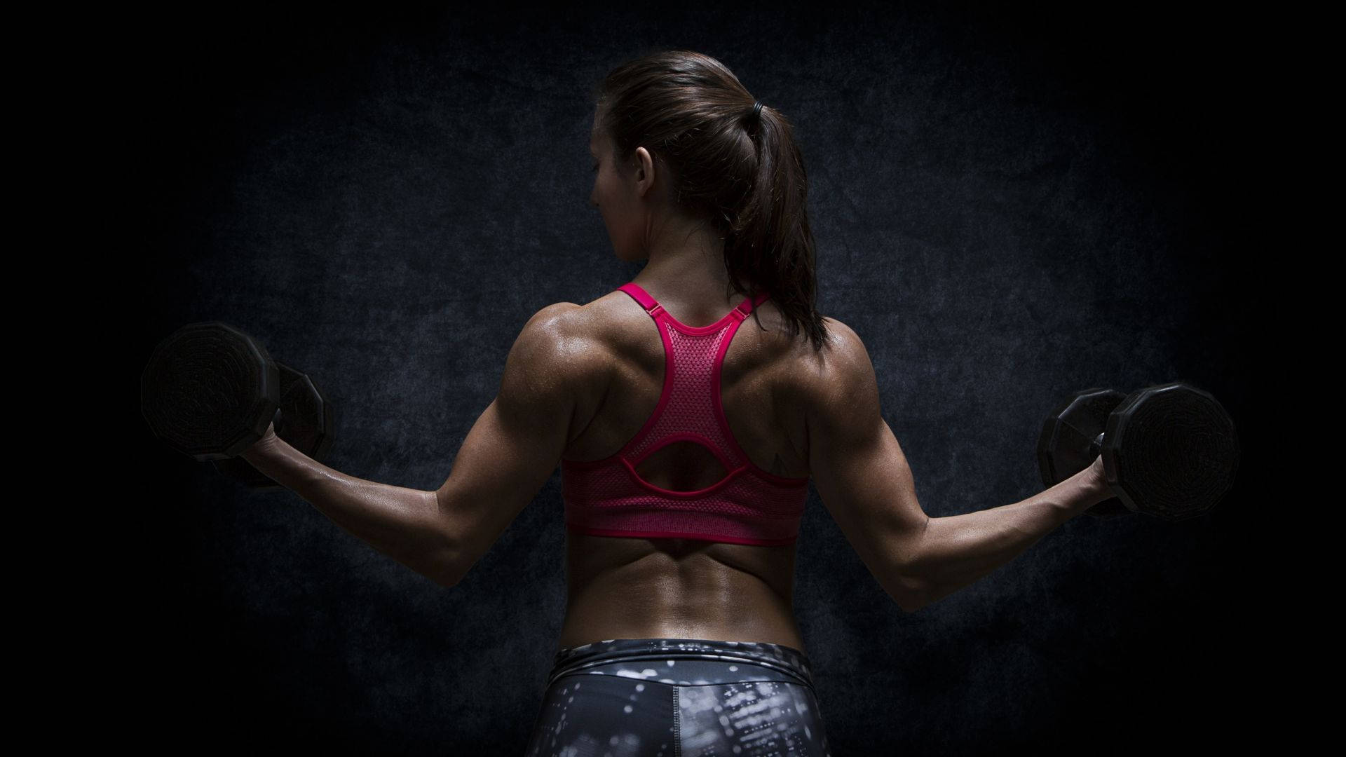 Fit Woman Back Muscles Wallpaper