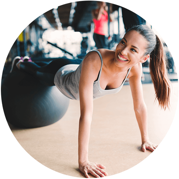 Fitness Enthusiast Performing Plankon Gym Ball PNG