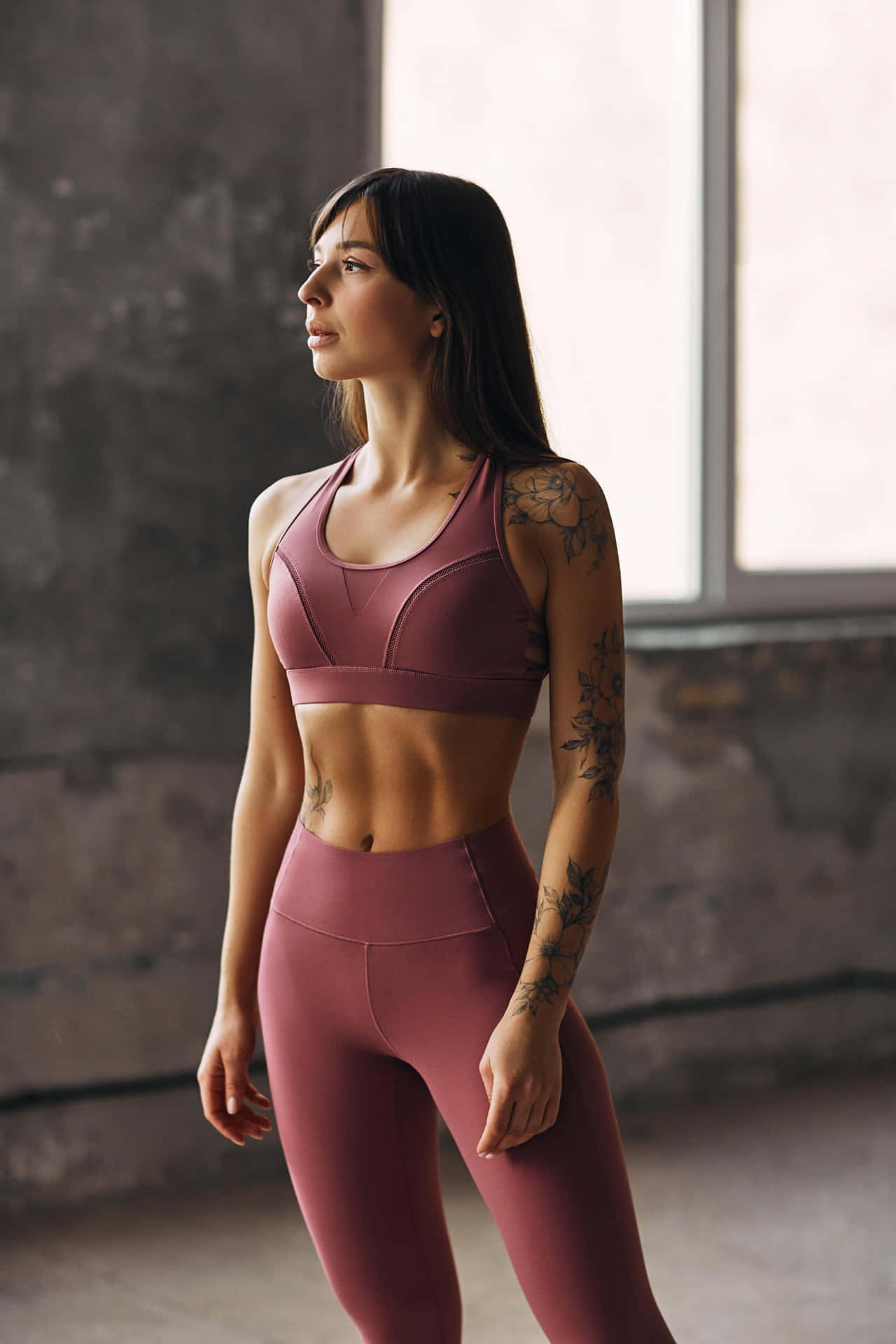 Fitness Model In Athleisure Wear Wallpaper