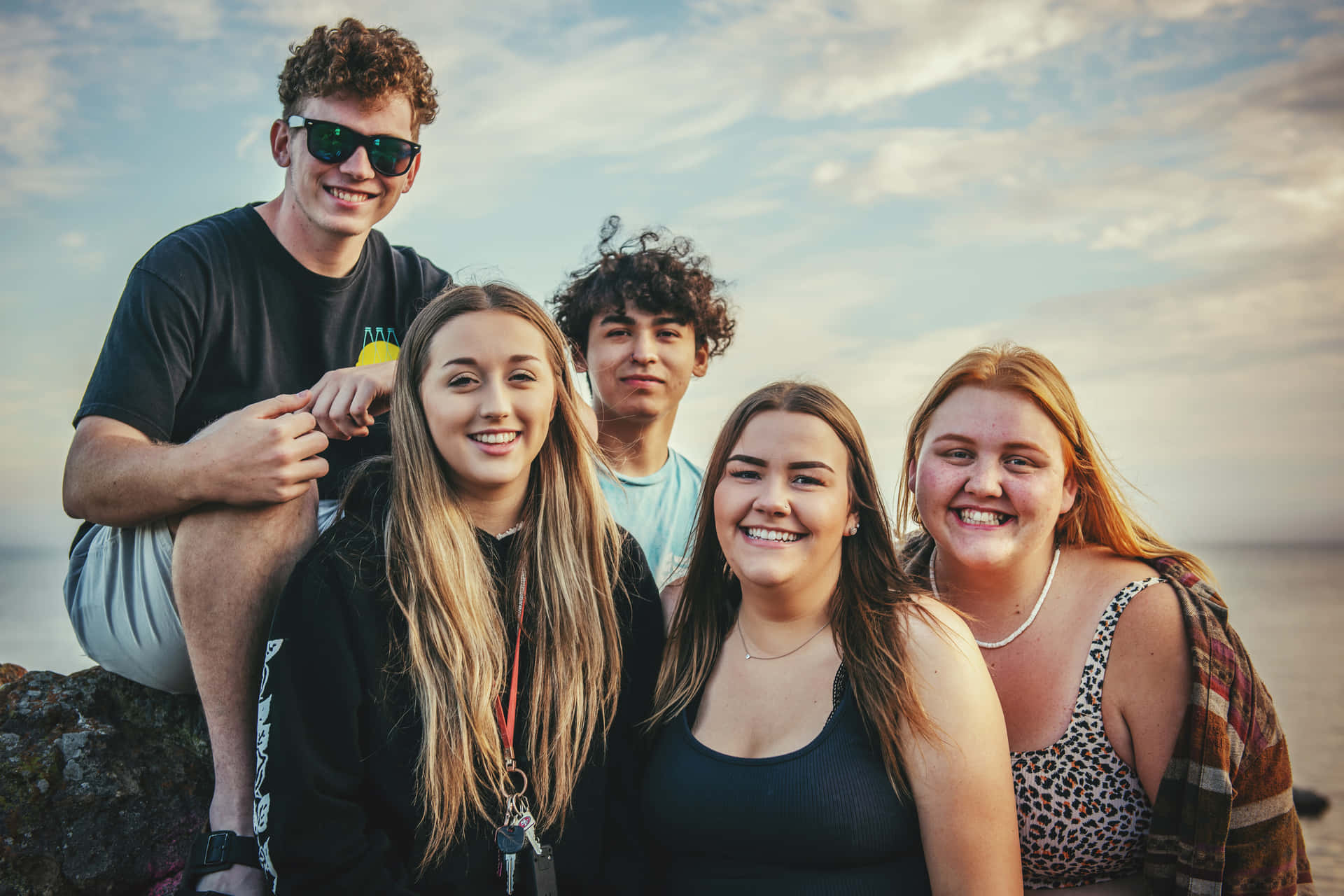 Five Young People Unique Smiles Wallpaper