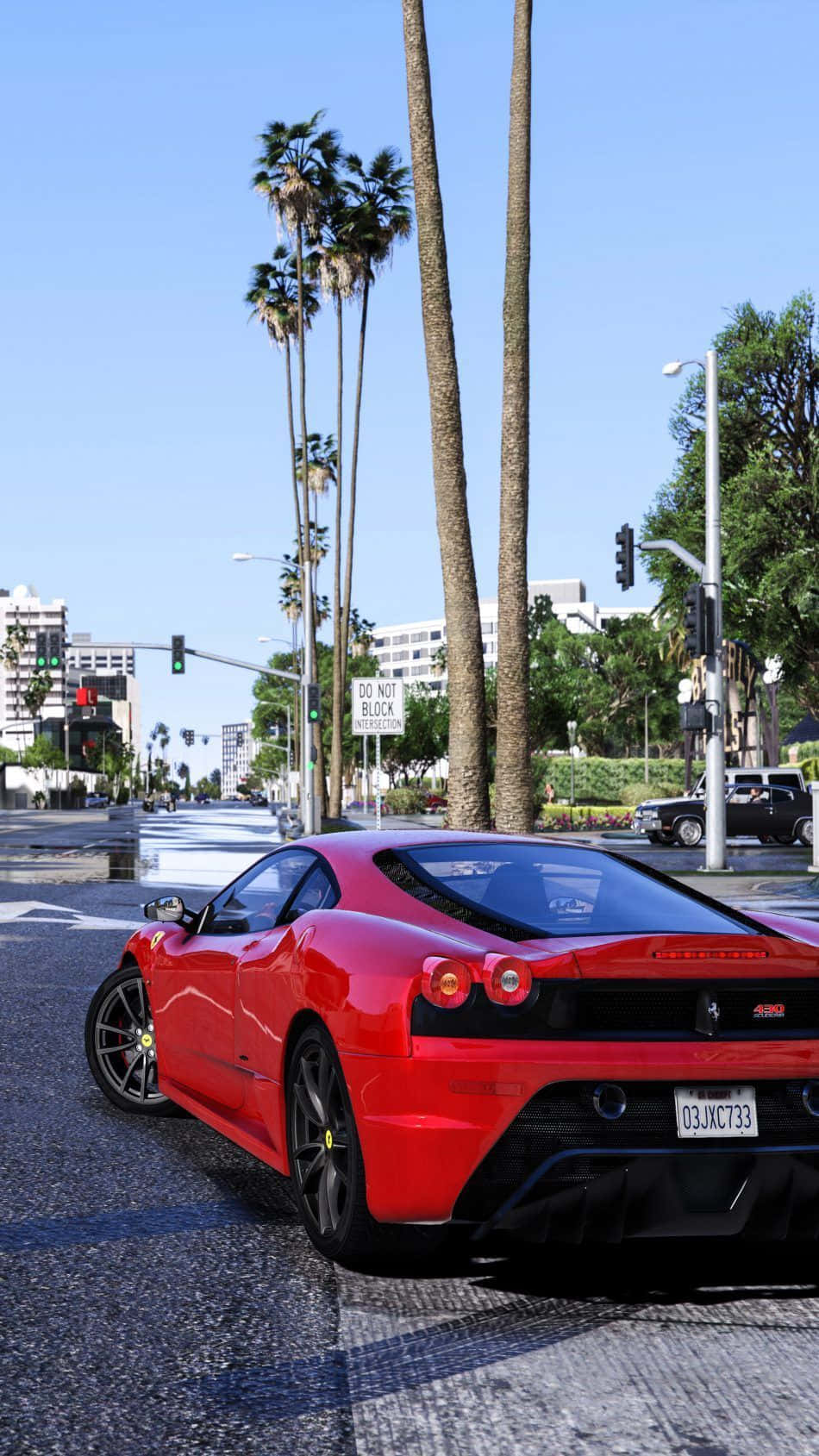 Et rødt Ferrari sportsvogn kører ned ad gaden. Wallpaper