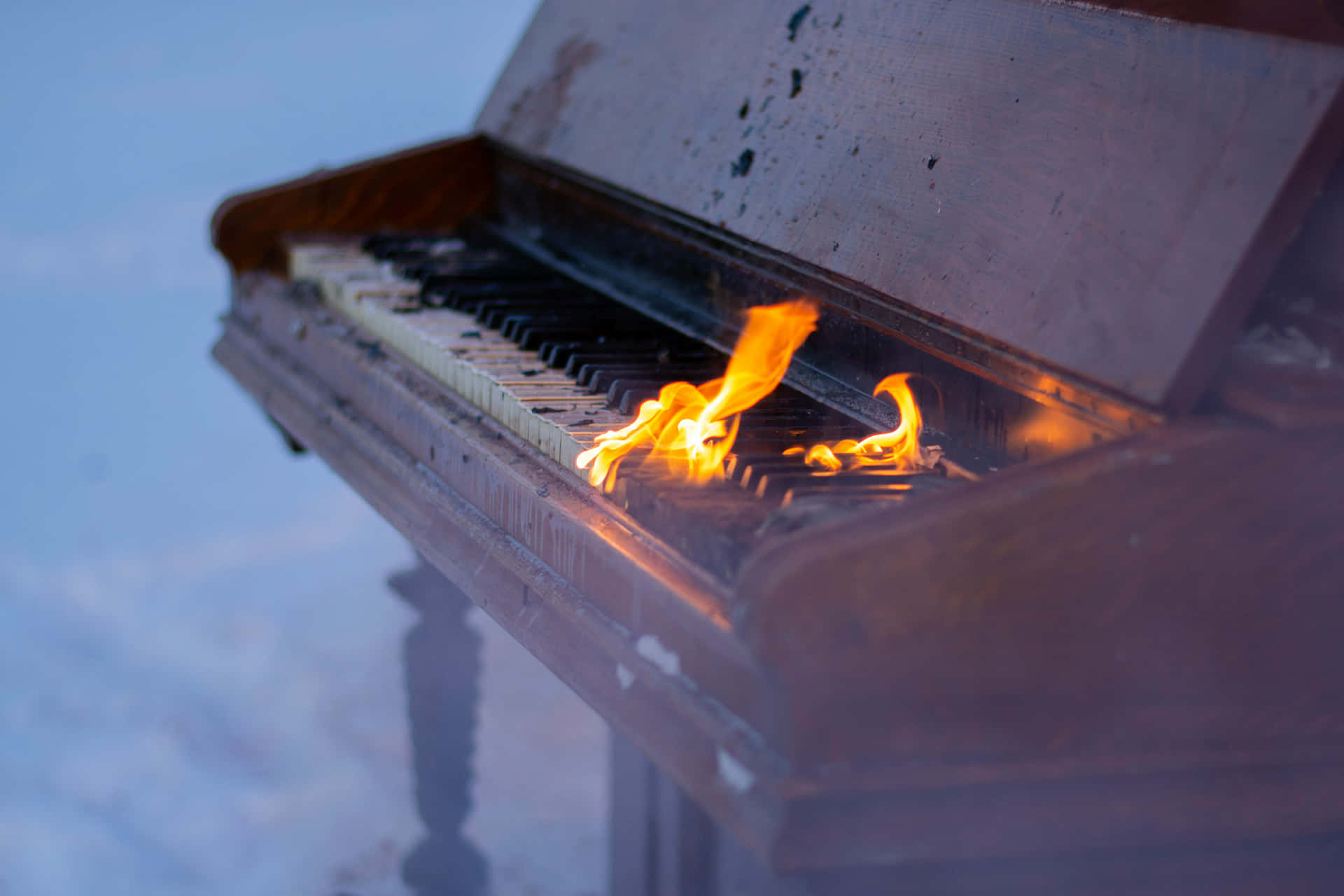 Flaming Pianoin Snow Wallpaper