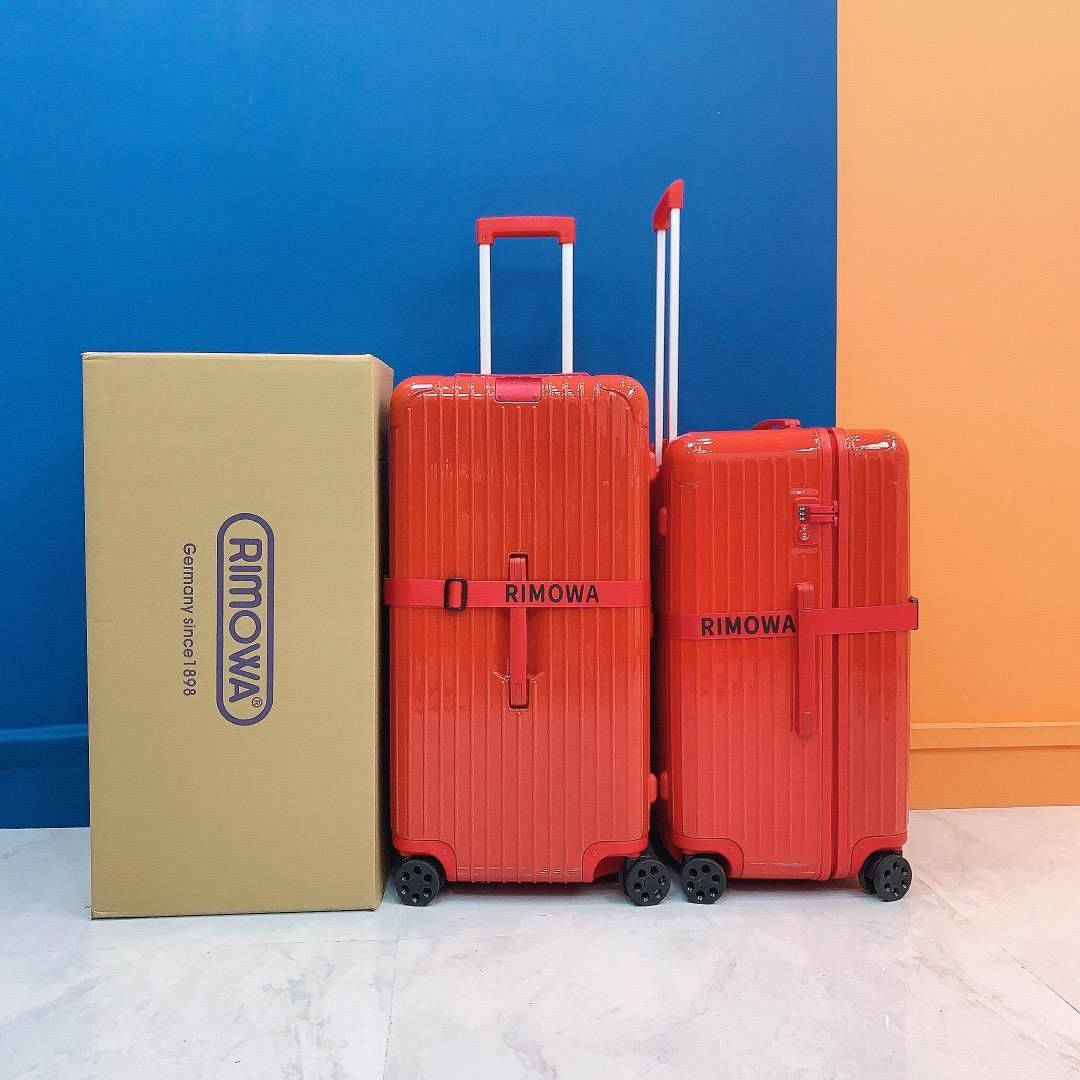Flamingo Red Rimowa Suitcases Wallpaper