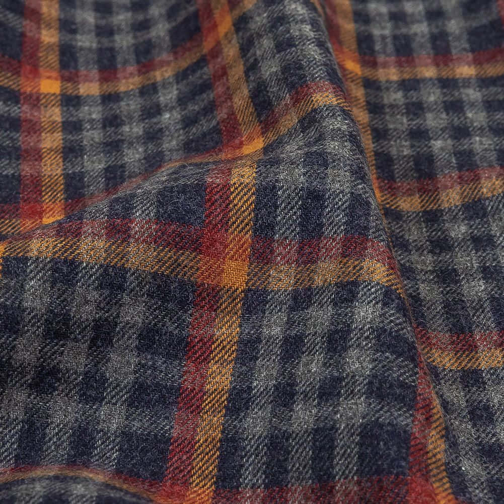 a close up of a plaid fabric