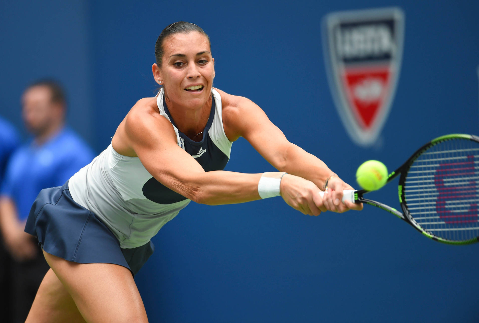 Flavia Pennetta in action on the tennis court Wallpaper