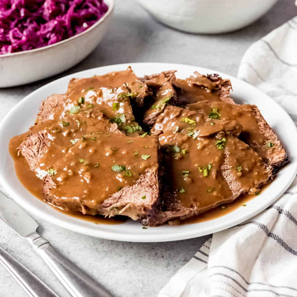 Flavorful Sauerbraten Traditional German Dish With Herbs Wallpaper