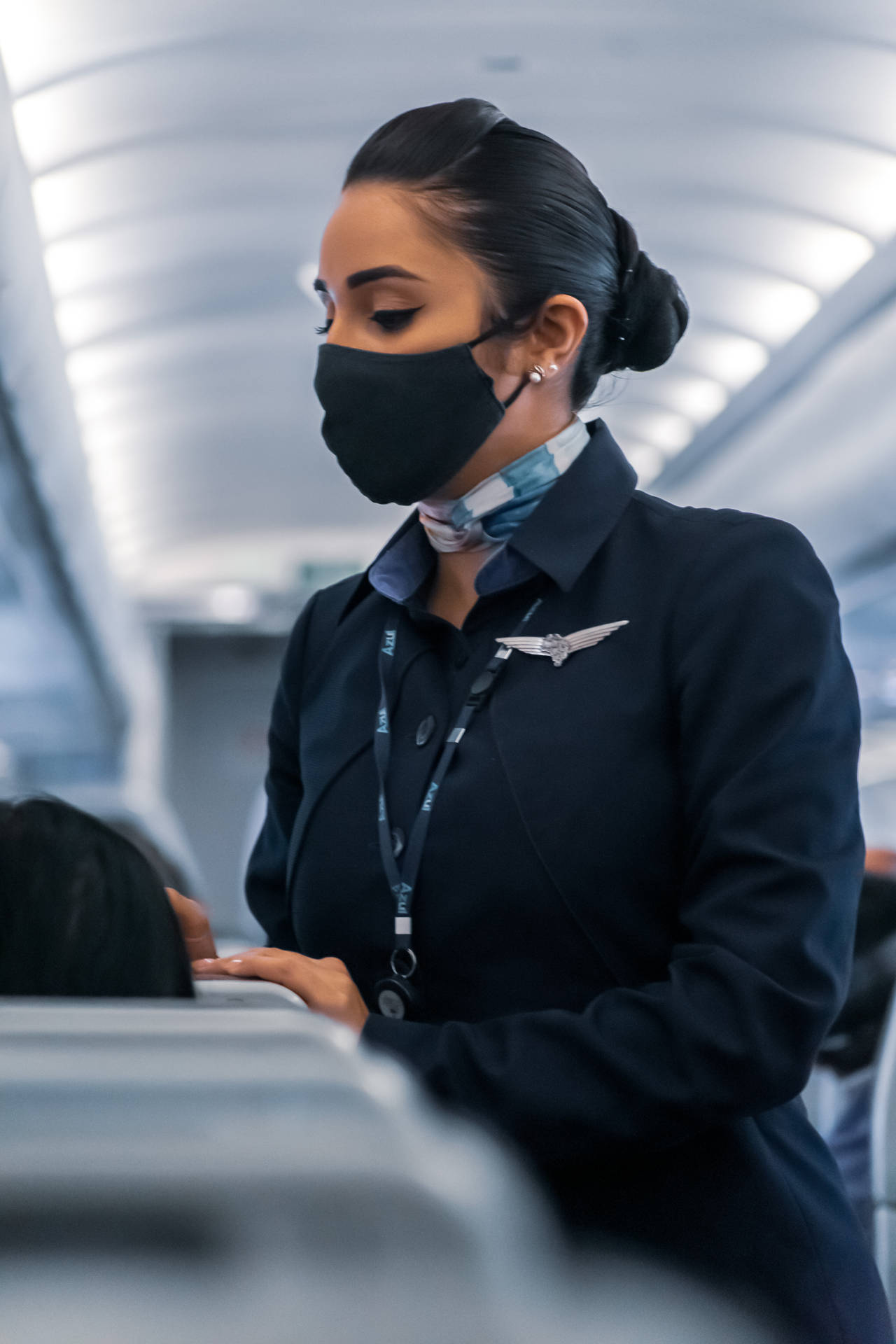 Flight Attendant Wearing Face Mask Wallpaper