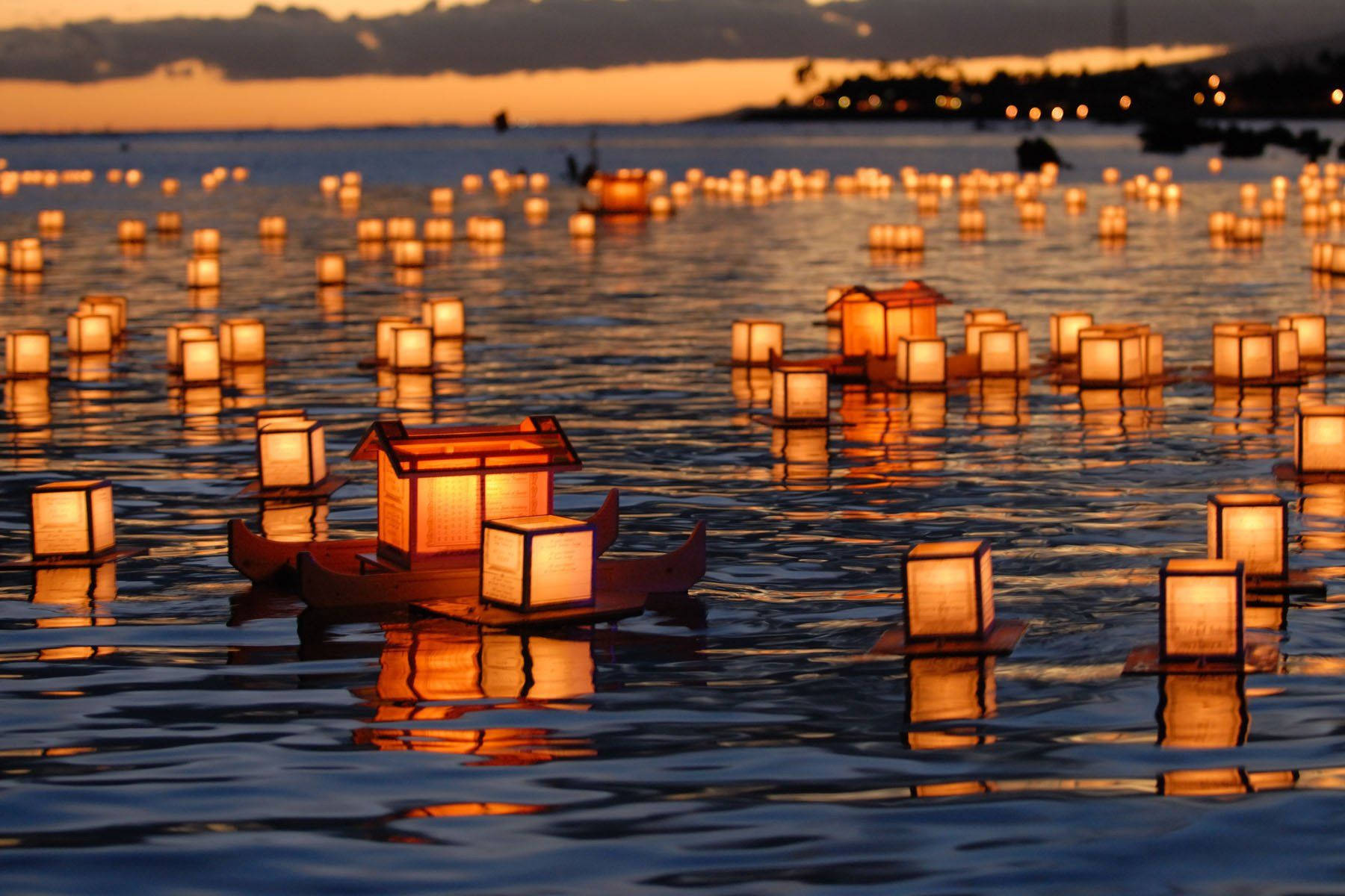 Floating Sea Lanterns Scenic Wallpaper