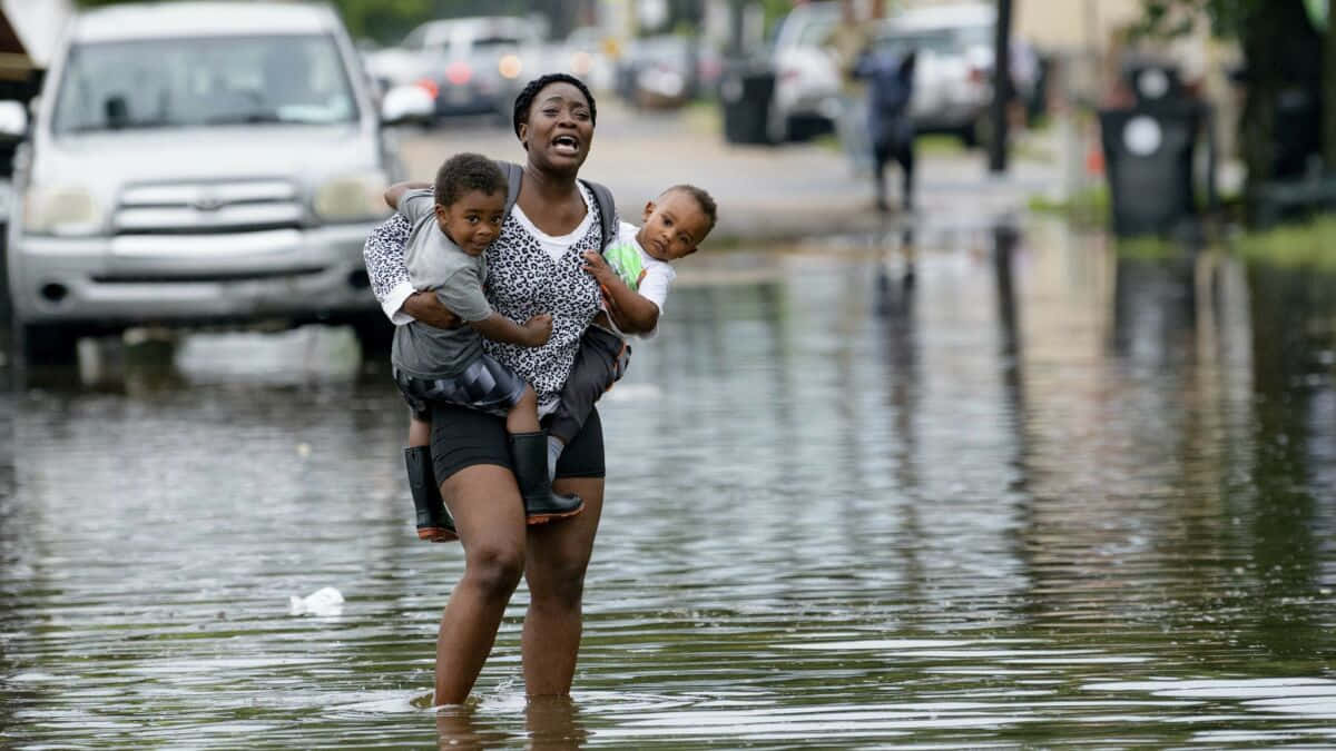 Unapiccola Comunità Che Affronta Le Conseguenze Di Un Devastante Alluvione.