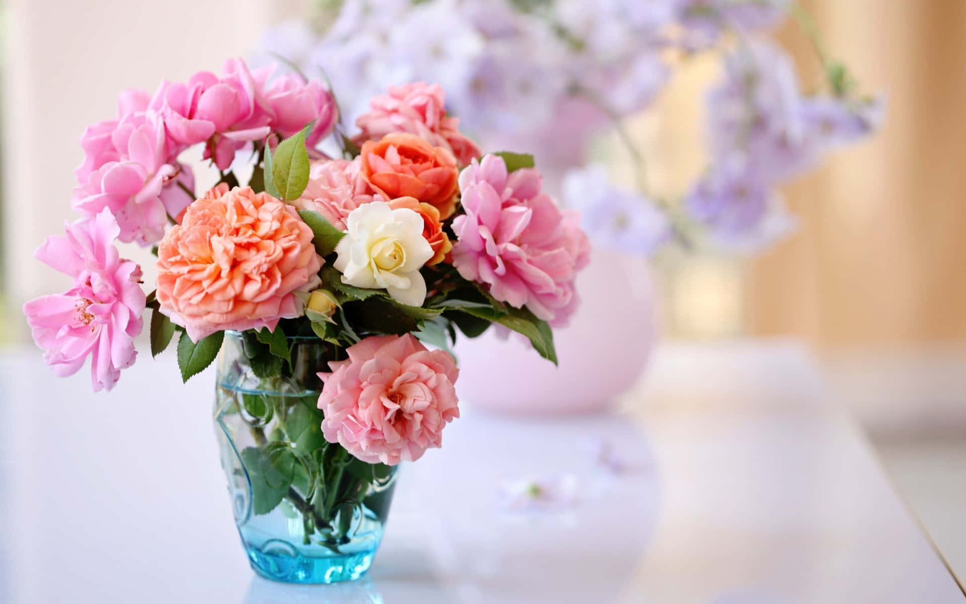 Beautiful Floral Arrangement on Table Wallpaper