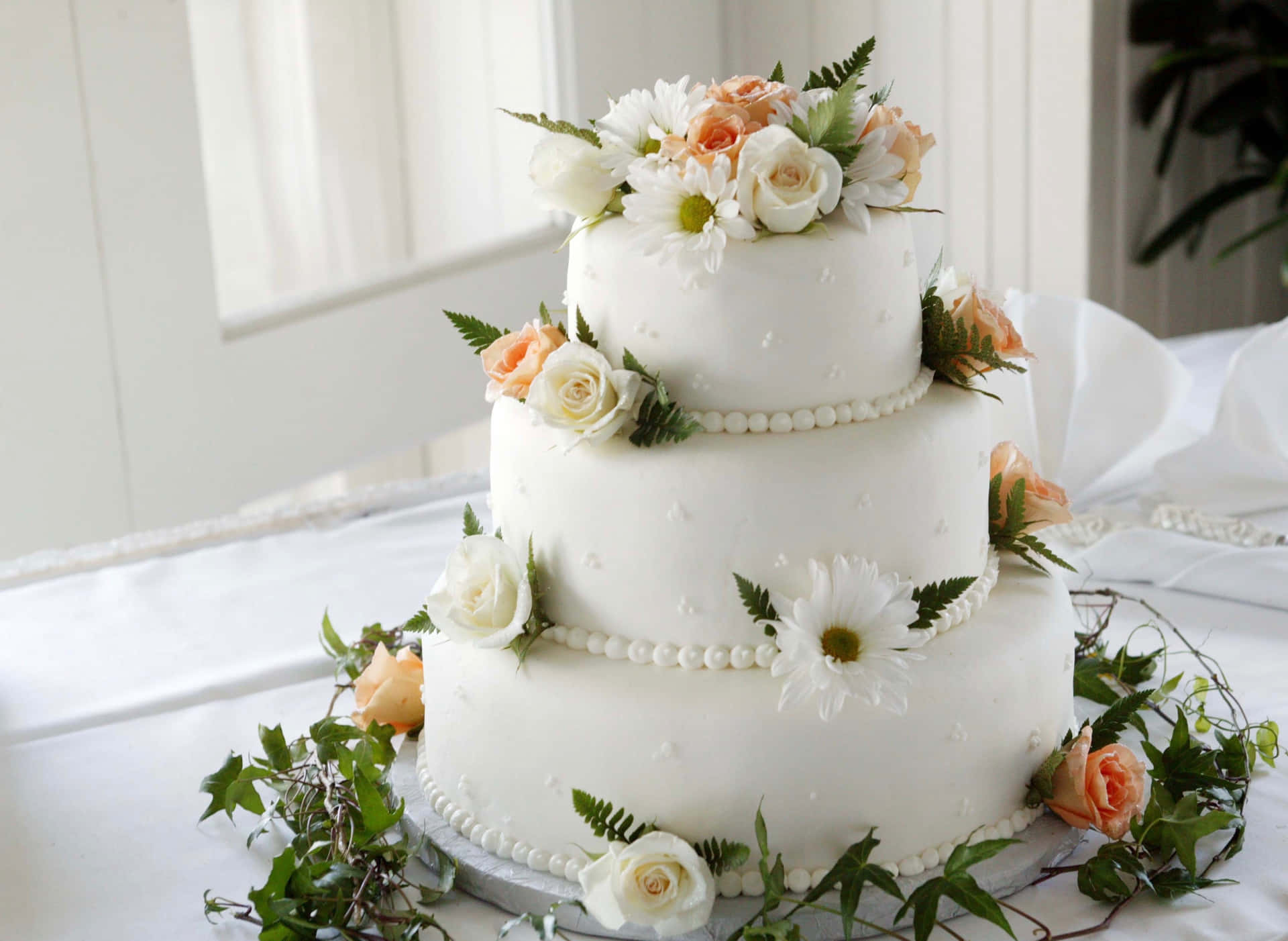 Delightful Floral Cake with Vibrant Edible Flowers Wallpaper