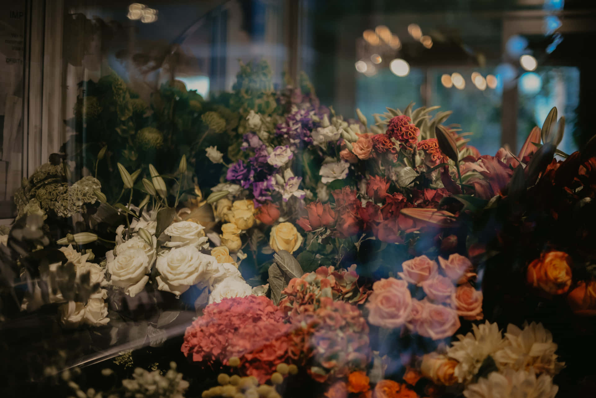 Floral Display Through Glass Wallpaper