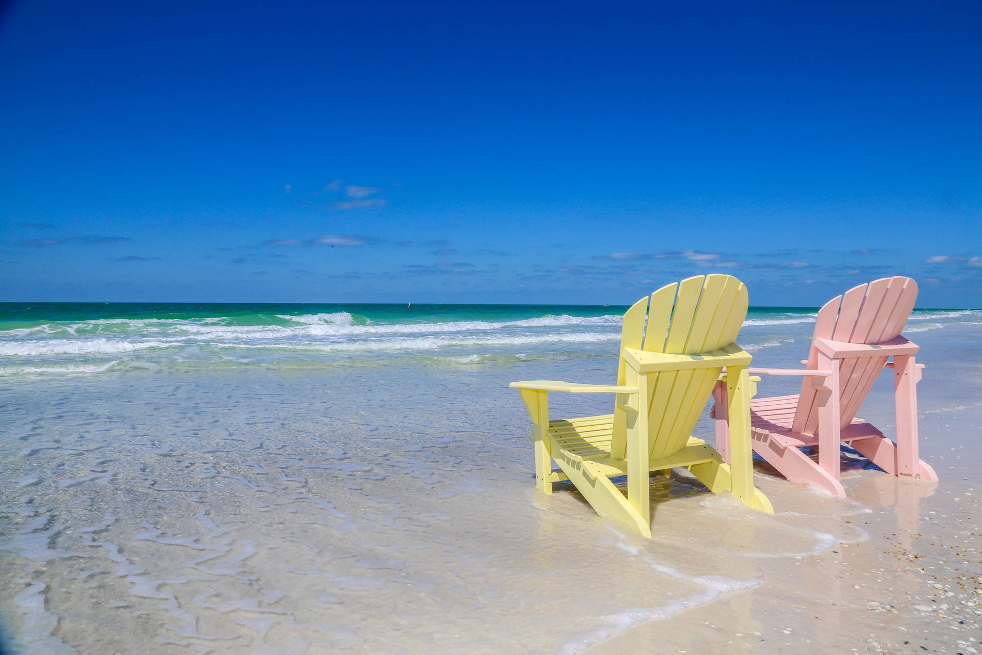 Florida Beach Pink And Yellow Sunchairs Wallpaper