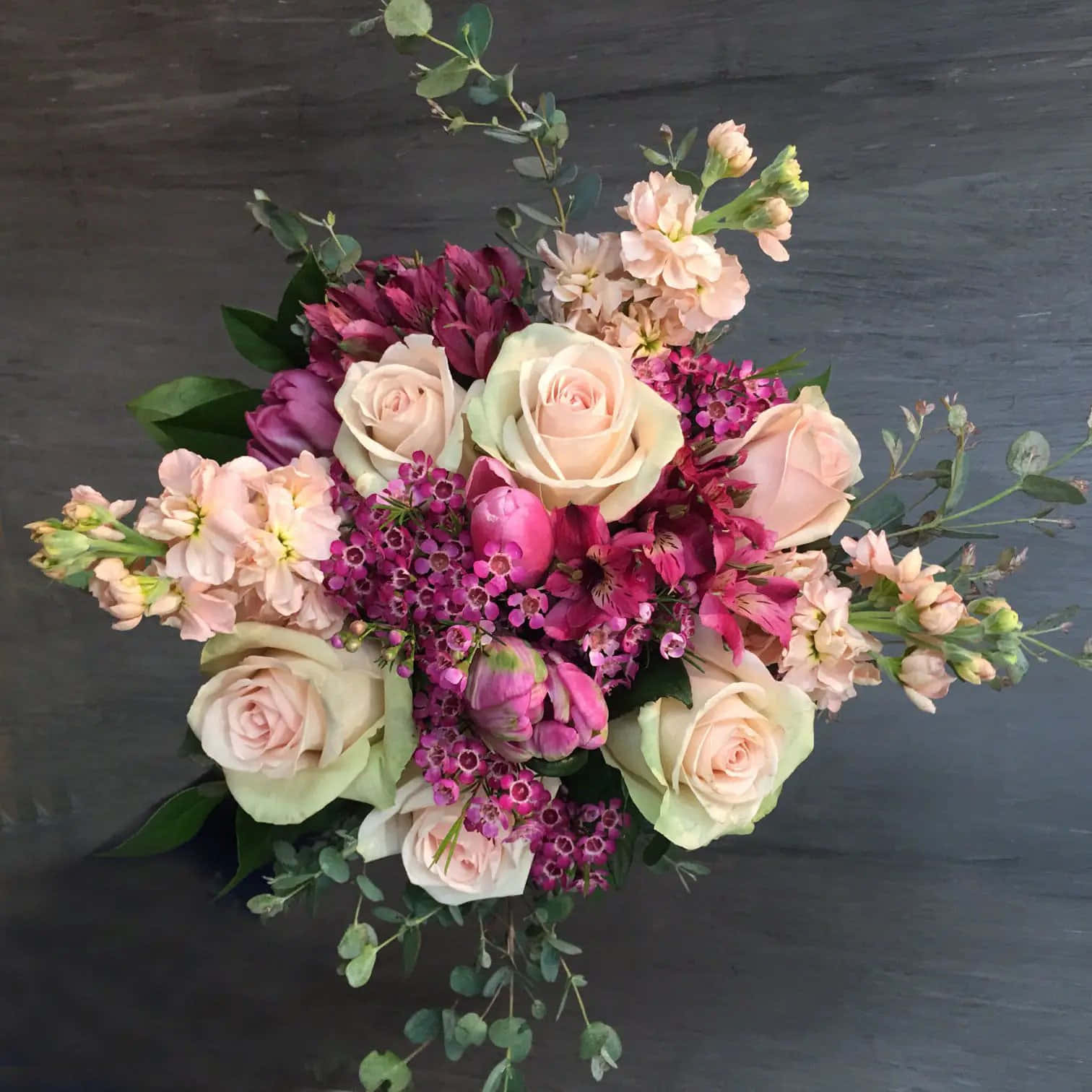 A Bouquet Of Pink And White Flowers