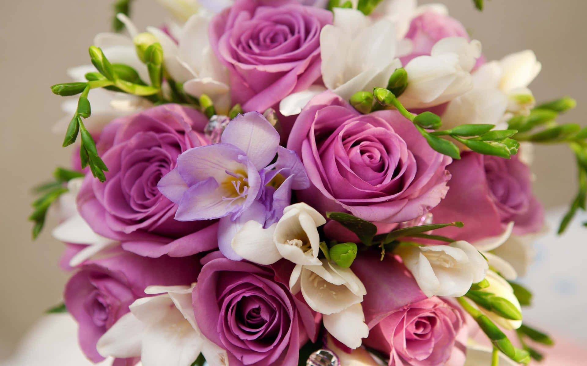 A Bouquet Of Purple Roses And White Orchids