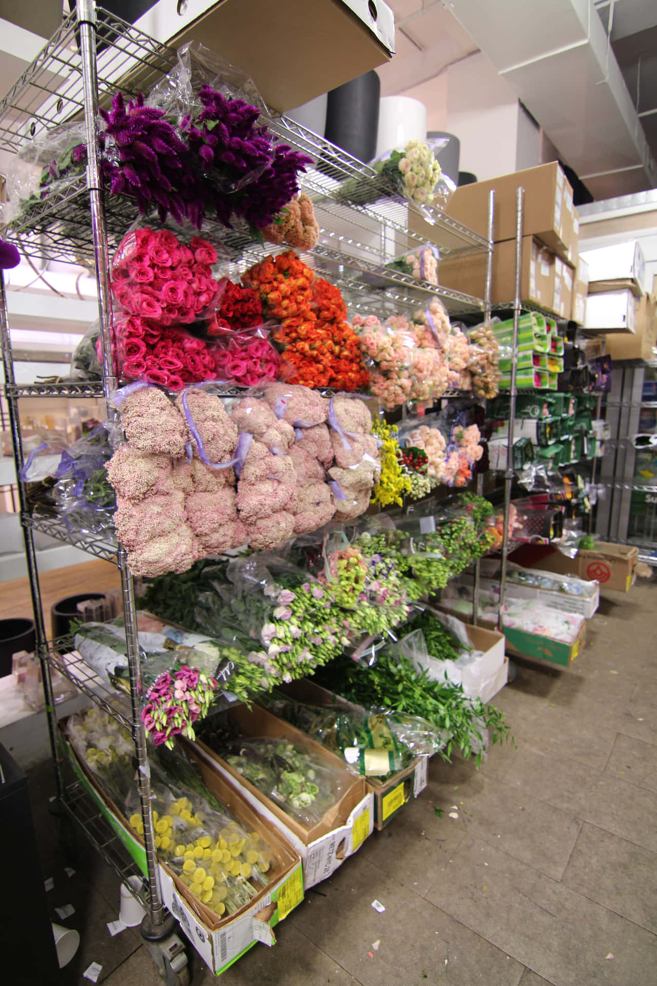 Vibrant Flower Market Displaying a Colorful Array of Blooms Wallpaper