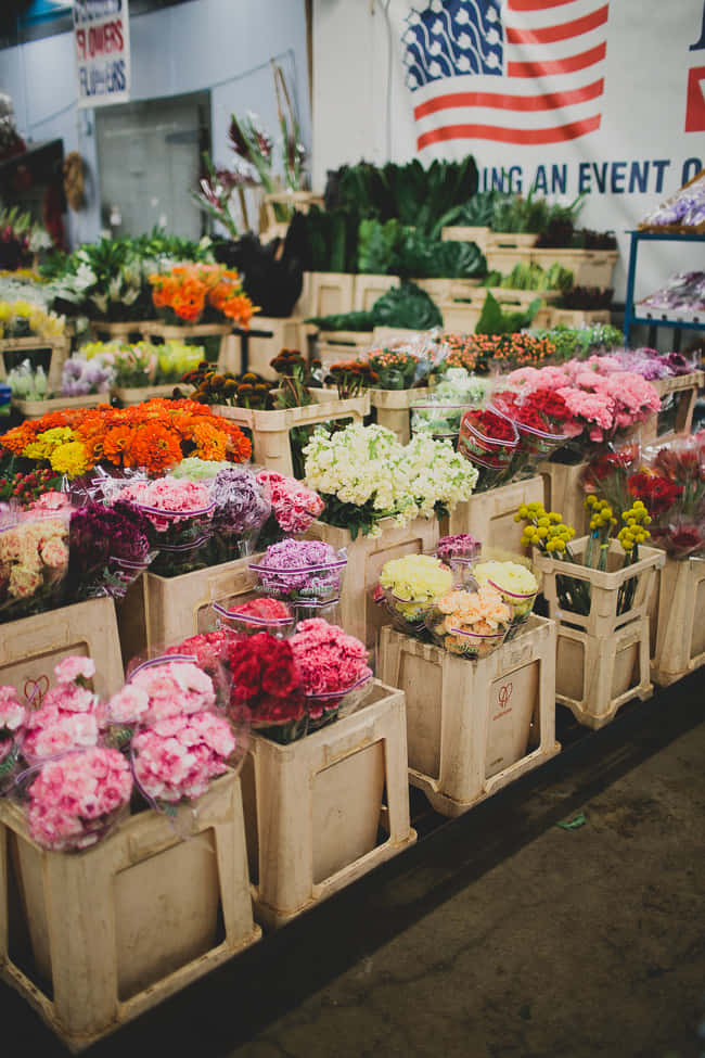 Blooming Flower Market Scene Wallpaper